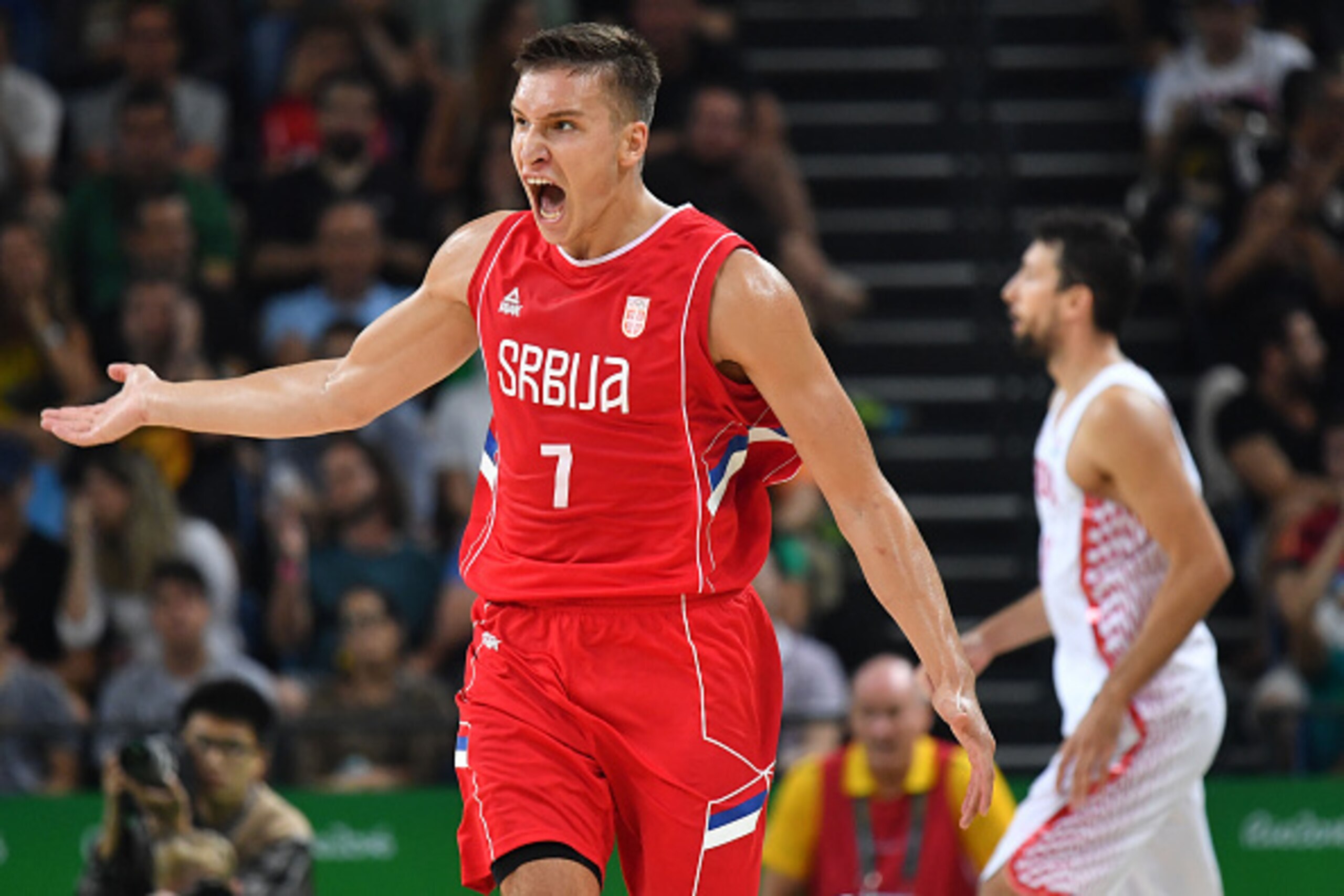 Serbia's shooting guard Bogdan Bogdanovic celebrates scoring during a Men's quarter final basketball match between Serbia and Croatia at the Carioca Arena 1 in Rio de Janeiro on August 17, 2016 during the Rio 2016 Olympic Games. / AFP / Andrej ISAKOVIC   