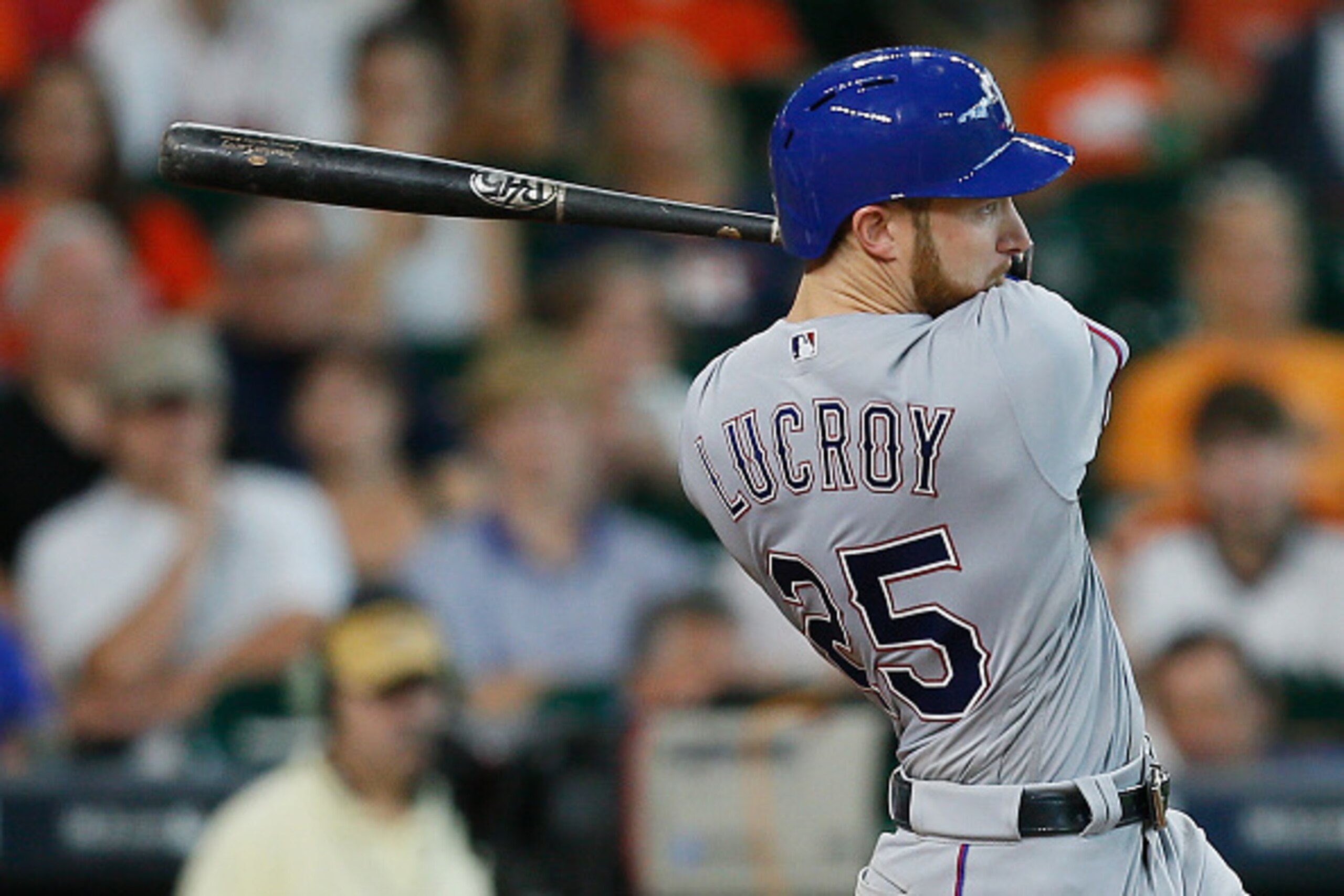 HOUSTON, TX - AUGUST 07:  Jonathan Lucroy #25 of the Texas Rangers doubles in a run in the fifth inning against the Houston Astros at Minute Maid Park on August 7, 2016 in Houston, Texas.  (Photo by Bob Levey/Getty Images)