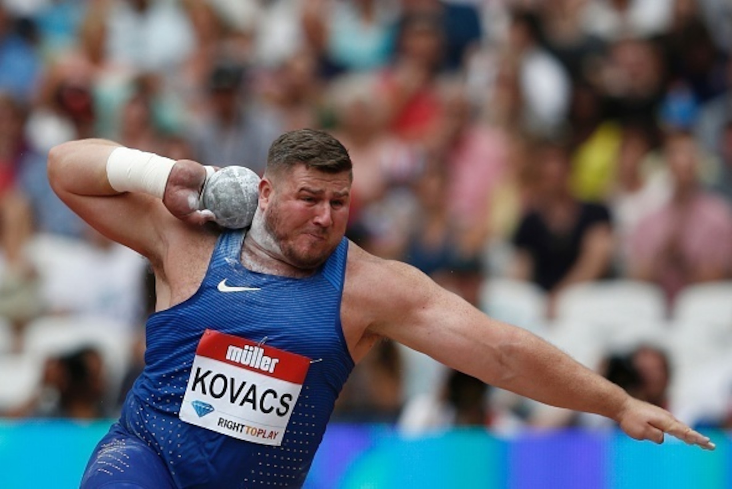 US athlete Joe Kovacs competes in the men's shot put during the IAAF Diamond League Anniversary Games athletics meeting at the Queen Elizabeth Olympic Park stadium in Stratford, east London on July 23, 2016. / AFP / ADRIAN DENNIS (Photo credit sho US athlete Joe Kovacs competes in the men's shot put during the IAAF Diamond League Anniversary Games athletics meeting at the Queen Elizabeth Olympic Park stadium in Stratford, east London on July 23, 2016. / AFP / ADRIAN DENNIS (Photo credit sho