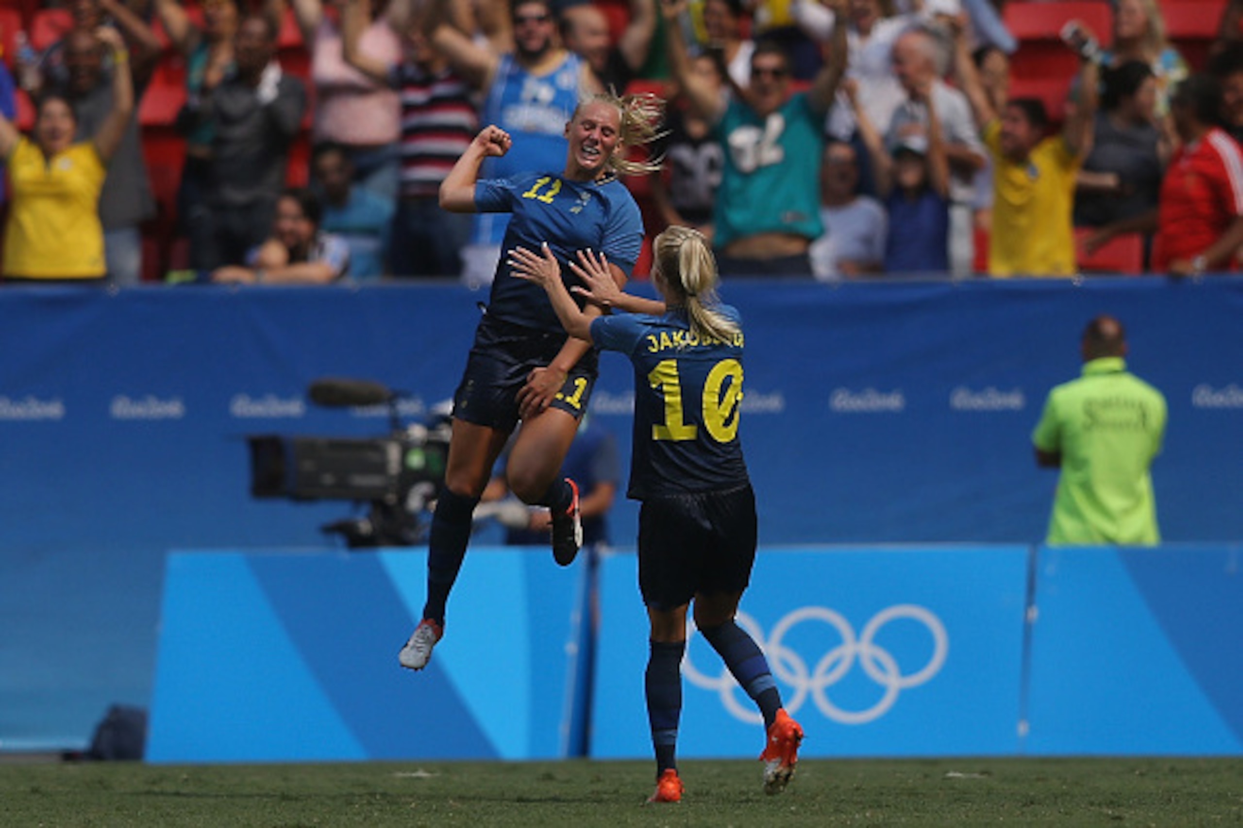 BRASILIA, BRAZIL - AUGUST 12:  Stina Blackstenius #11 of Sweden celebrates her goal with teammate Sofia Jakobsson #10 in the second half against the United States during the Women's Football Quarterfinal match at Mane Garrincha Stadium on Day 7 of the Rio