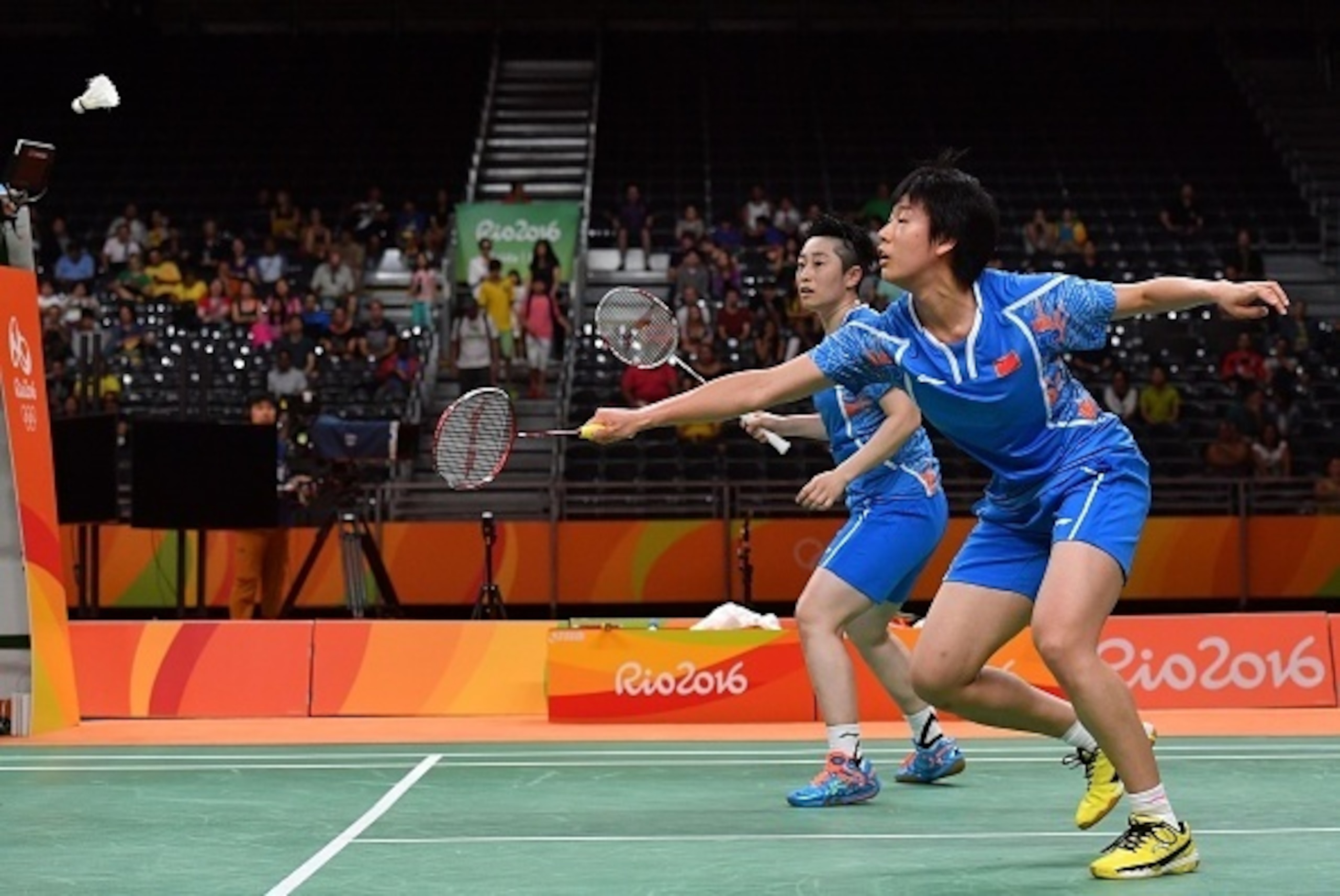 China's Tang Yuanting (R) and China's Yu Yang returns against South Korea's Jung Kyung Eun and South Korea's Shin Seung Chan during their women's doubles Bronze Medal badminton match at the Riocentro stadium in Rio de Janeiro on August 18, 2016, at the Ri