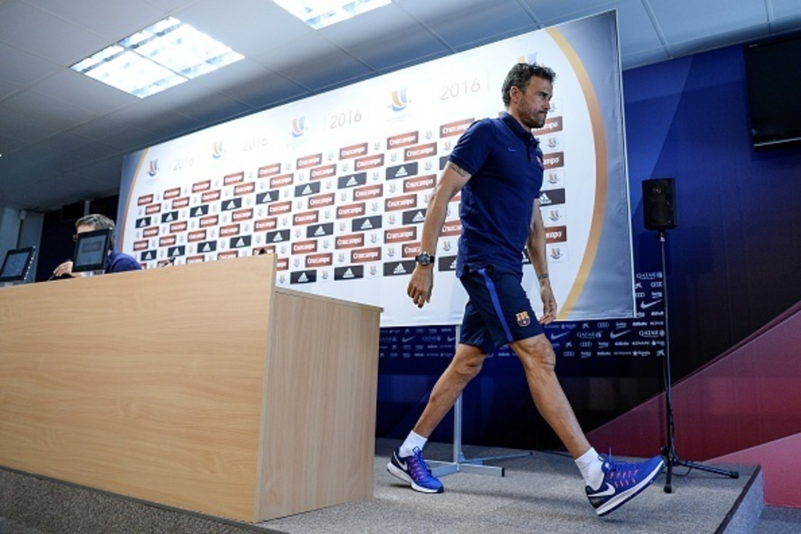 Barcelona's coach Luis Enrique leaves after a press conference following a training session at the Sports Center FC Barcelona Joan Gamper in Sant Joan Despi, near to Barcelona on August 13, 2016, on the eve of the first leg of the Spanish Super Cup footba