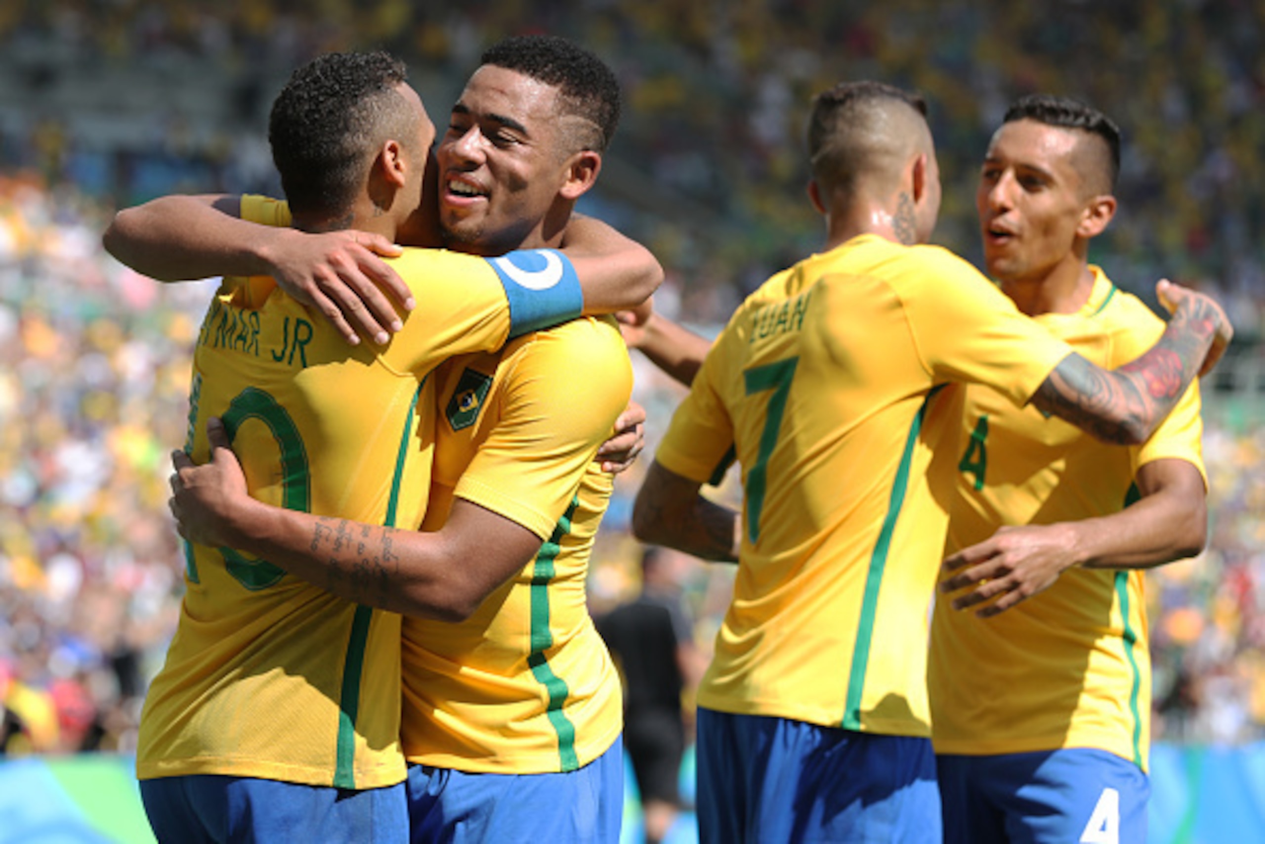 RIO DE JANEIRO, BRAZIL - AUGUST 17:  Neymar of Brazil celebrates with Gabriel Jesus after he scores Brazil's third goal during the Semi Final match between Brazil and Honduras at Maracana Stadium on August 17, 2016 in Rio de Janeiro, Brazil. (Photo by Ian