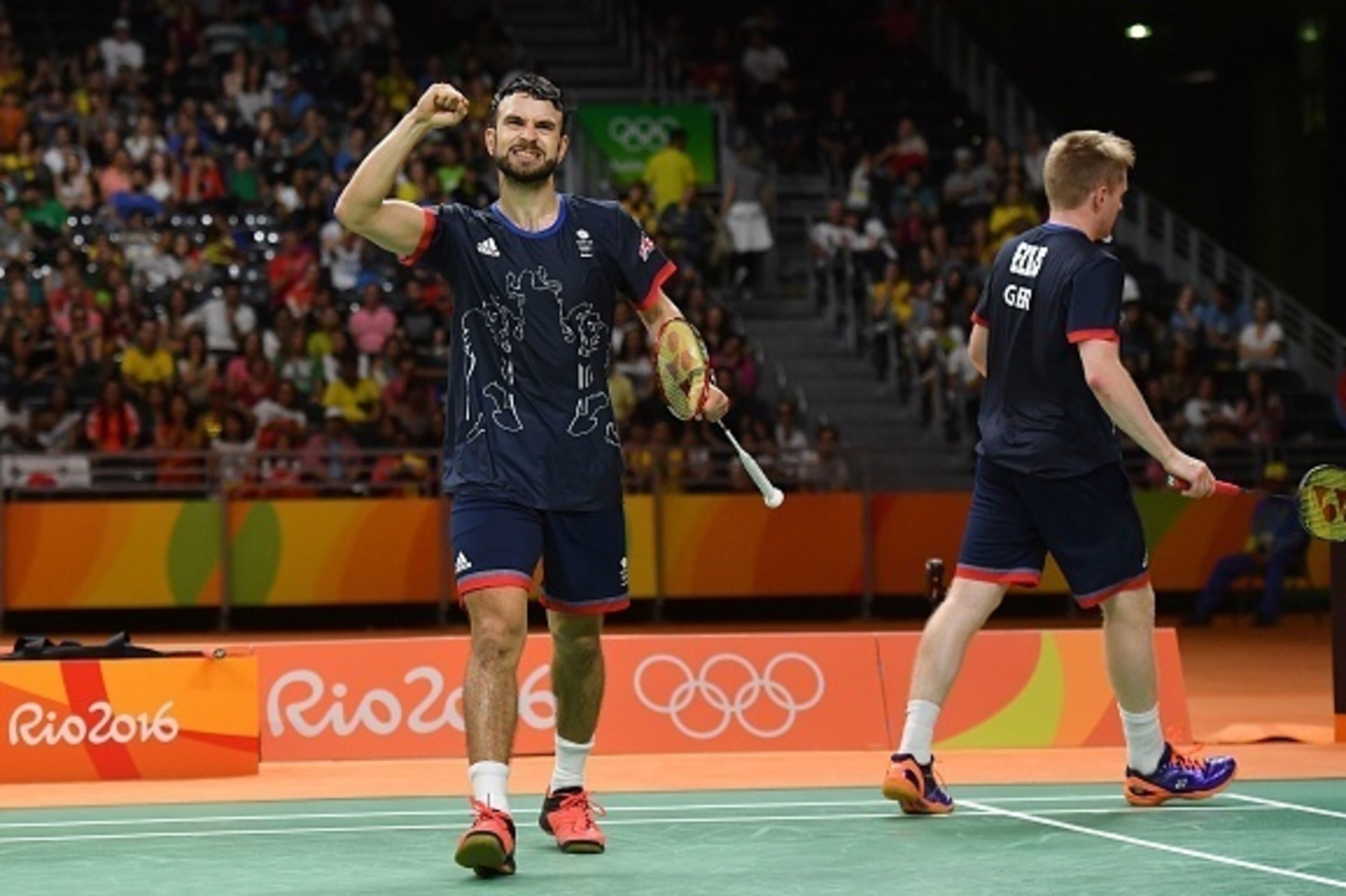 Great Britain's Marcus Ellis (R) and Great Britain's Chris Langridge celebrate after winning a point against China's Chai Biao and China's Hong Wei during their men's doubles Bronze Medal badminton match at the Riocentro stadium in Rio de Janeiro on Augus Great Britain's Marcus Ellis (R) and Great Britain's Chris Langridge celebrate after winning a point against China's Chai Biao and China's Hong Wei during their men's doubles Bronze Medal badminton match at the Riocentro stadium in Rio de Janeiro on Augus