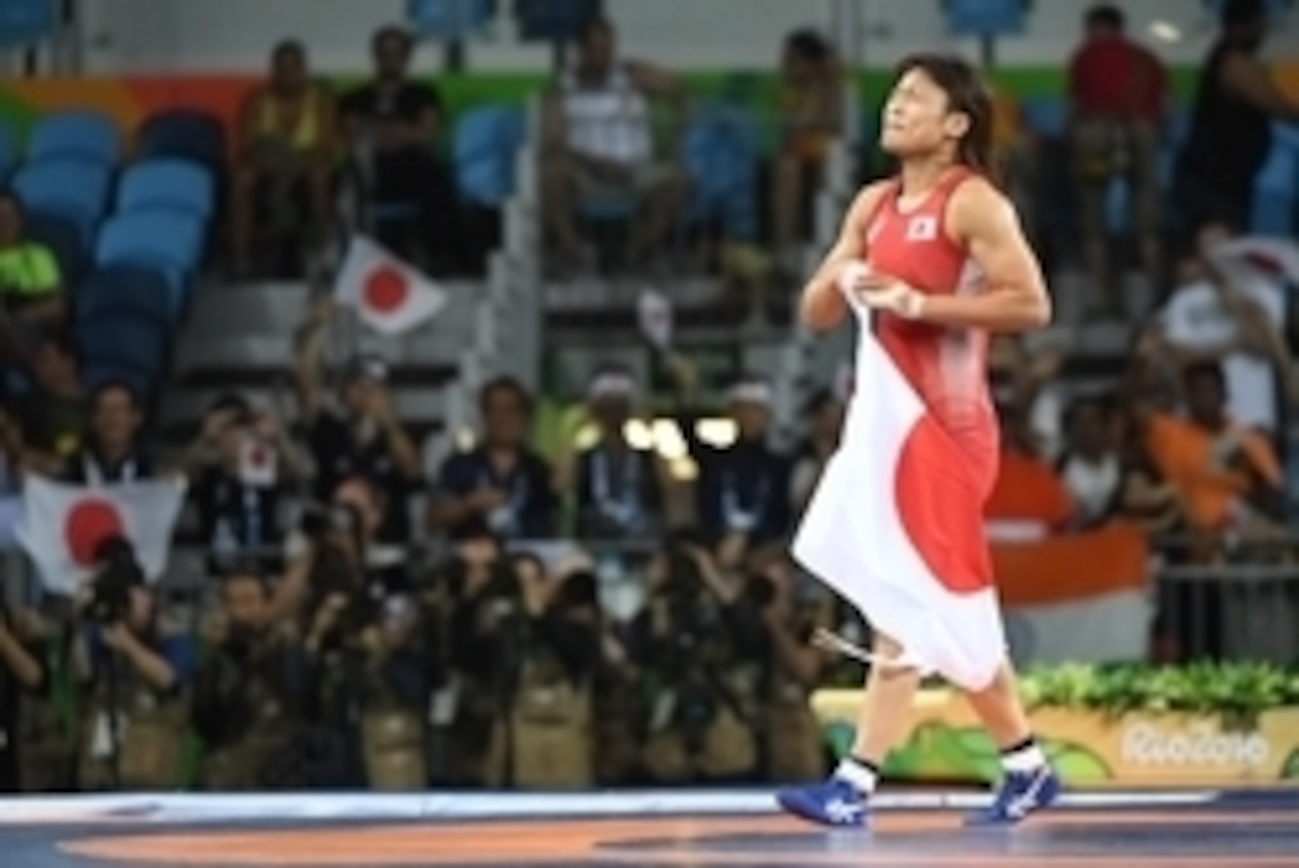 Aug 17, 2016; Rio de Janeiro, Brazil; Kaori Icho (JPN) celebrates a win over Valeriia Koblova Zholobova (RUS) in a women's freestyle 58kg wrestling gold medal match at Carioca Arena 2 during the Rio 2016 Summer Olympic Games. Mandatory Credit: John David 