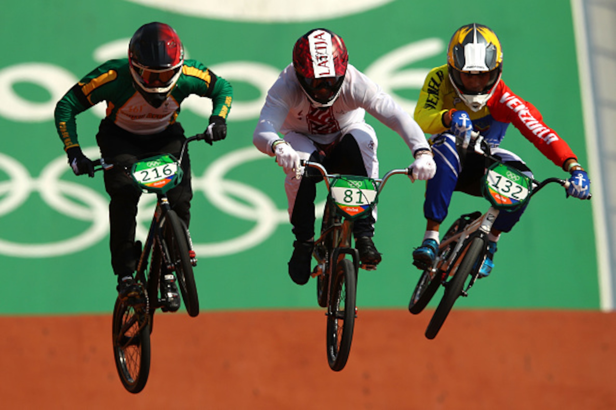 RIO DE JANEIRO, BRAZIL - AUGUST 18: Kyle Dodd of South Africa, Maris Strombergs of Latvia and Jefferson Milano of Venezuela compete in the Cycling BMX - Men's Quarterfinals on Day 13 of the 2016 Rio Olympic Games at Olympic BMX Centre on August 18, 2016 i RIO DE JANEIRO, BRAZIL - AUGUST 18: Kyle Dodd of South Africa, Maris Strombergs of Latvia and Jefferson Milano of Venezuela compete in the Cycling BMX - Men's Quarterfinals on Day 13 of the 2016 Rio Olympic Games at Olympic BMX Centre on August 18, 2016 i