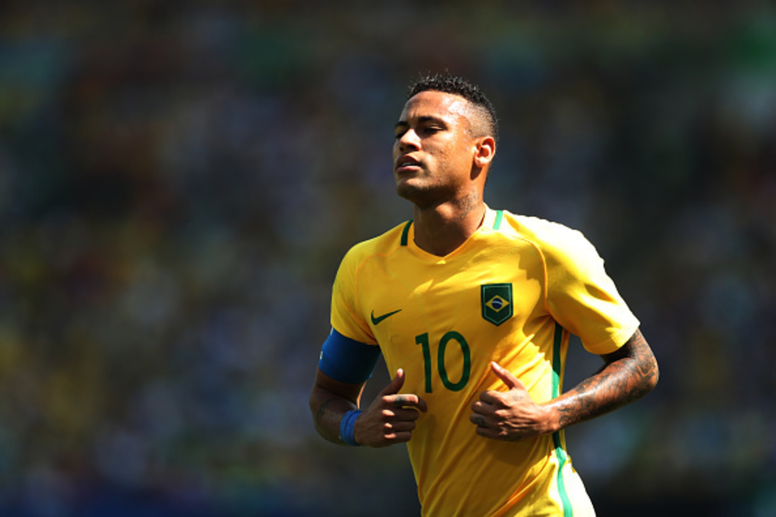 RIO DE JANEIRO, BRAZIL - AUGUST 17:  Neymar of Brazil looks on during the Semi Final match between Brazil and Honduras at Maracana Stadium on August 17, 2016 in Rio de Janeiro, Brazil. (Photo by Ian MacNicol/Getty Images)