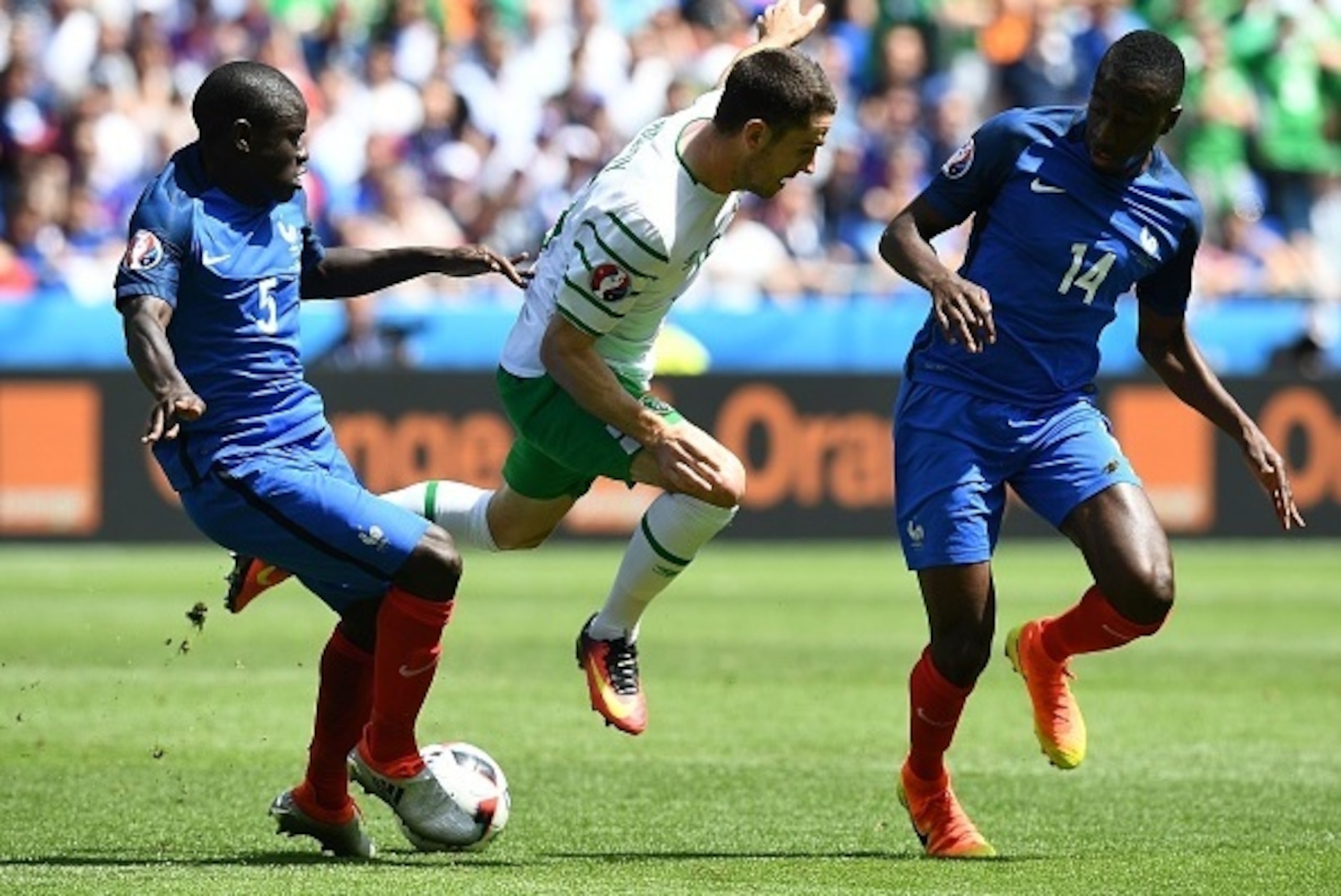 Ireland's midfielder Robert Brady (C) vies for the ball with France's midfielder N'Golo Kante (L) and France's midfielder Blaise Matuidi (R) during the Euro 2016 round of 16 football match between France and Republic of Ireland at the Parc Olympique Lyonn Ireland's midfielder Robert Brady (C) vies for the ball with France's midfielder N'Golo Kante (L) and France's midfielder Blaise Matuidi (R) during the Euro 2016 round of 16 football match between France and Republic of Ireland at the Parc Olympique Lyonn