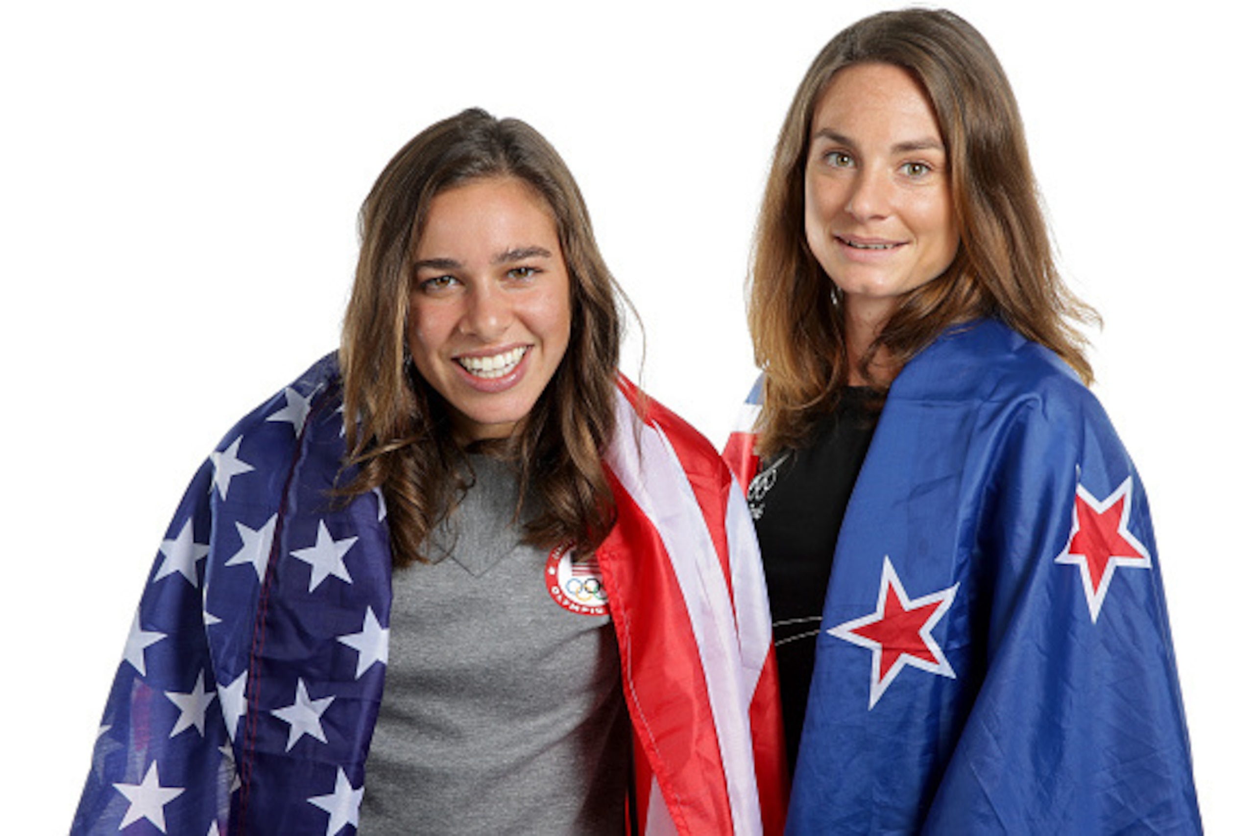 RIO DE JANEIRO, BRAZIL - AUGUST 17:  New Zealand distance runner, Nikki Hamblin and American runner, Abbey D'Agostino pose for a portrait on August 17, 2016 in Rio de Janeiro, Brazil. Hamblin and D'Agostino came last in their 5000m heat on Tuesday after t