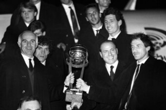 Berlusconi (second from right) celebrates with Sacchi (left).