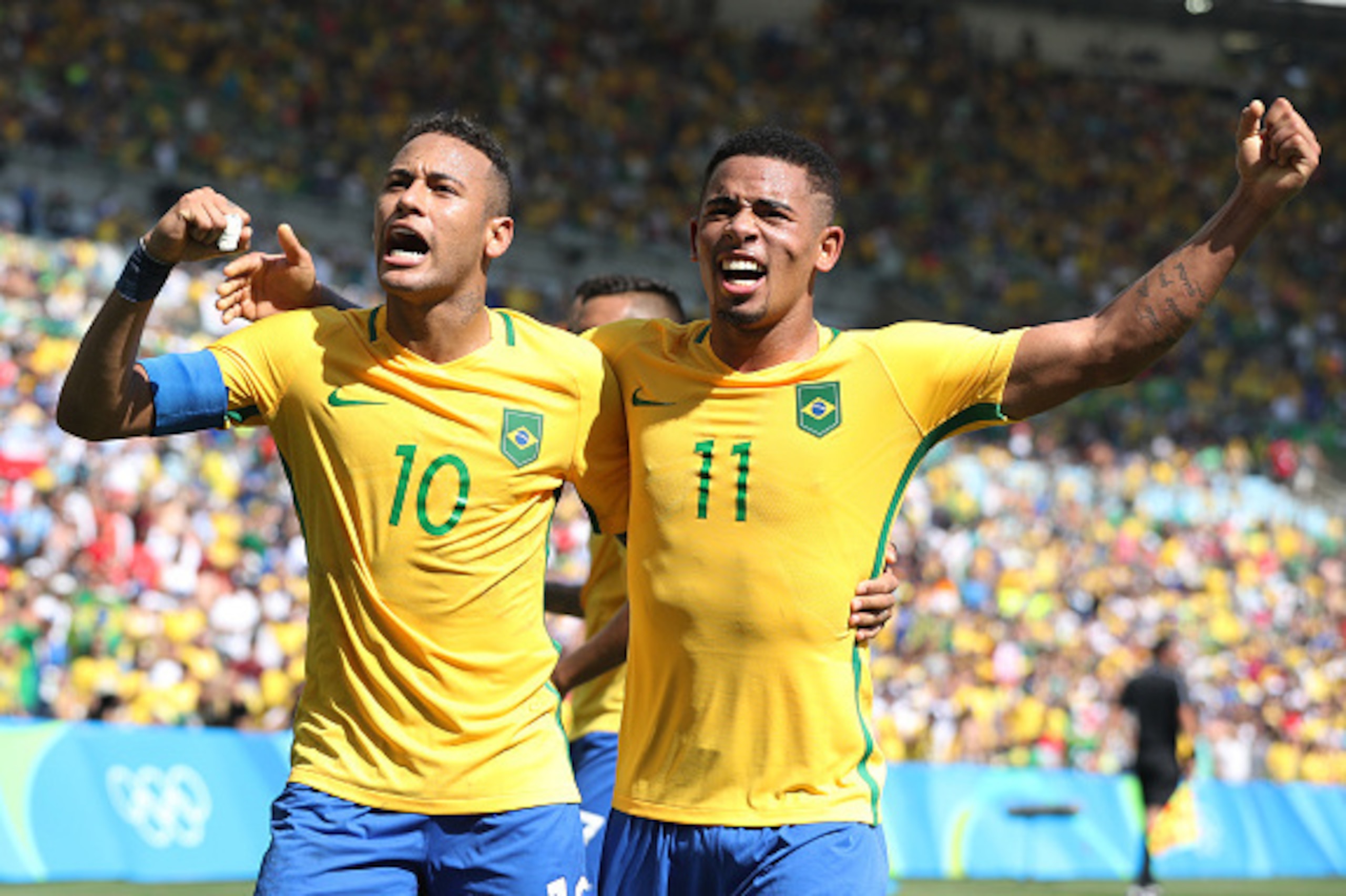 RIO DE JANEIRO, BRAZIL - AUGUST 17:  Neymar of Brazil celebrates with Gabriel Jesus after he scores Brazil's third goal during the Semi Final match between Brazil and Honduras at Maracana Stadium on August 17, 2016 in Rio de Janeiro, Brazil. (Photo by Ian
