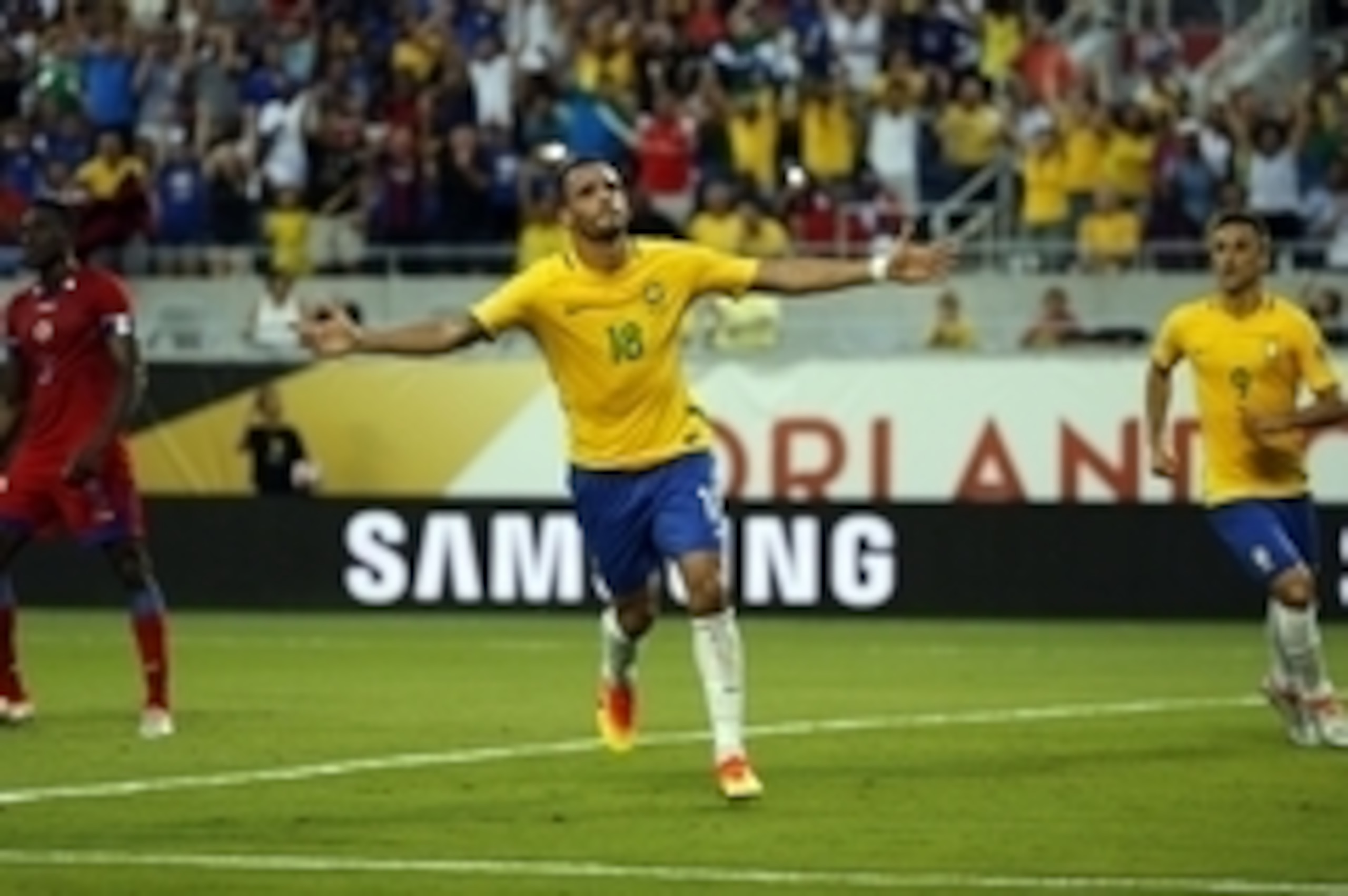 Jun 8, 2016; Orlando, FL, USA; Brazil midfielder Renato Augusto (18)  celebrates after he scored a goal against the Haiti during the first half of the group play stage of the 2016 Copa America Centenario at Camping World Stadium. Mandatory Credit: Kim Kle