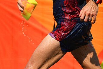 France's Yohann Diniz sponges away blood as he competes in the Men's 50km Race Walk during the athletics event at the Rio 2016 Olympic Games in Pontal in Rio de Janeiro on August 19, 2016.   / AFP / Jewel SAMAD        (Photo credit should read JEWEL SAMAD