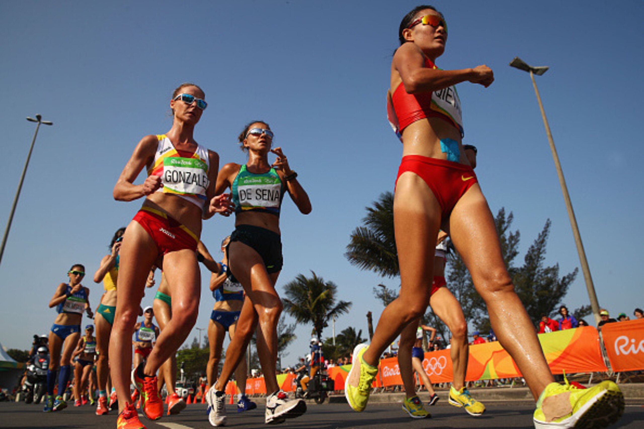 RIO DE JANEIRO, BRAZIL - AUGUST 19:  Raquel Gonzalez of Spain, Erica de Sena of Brazil and Shijie Qieyang of China compete in the Women's 20km Walk final on Day 14 of the Rio 2016 Olympic Games at Pontal on August 19, 2016 in Rio de Janeiro, Brazil.  (Pho