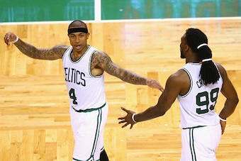 BOSTON, MA - APRIL 24:  Isaiah Thomas #4 of the Boston Celtics celebrates with Jae Crowder #99 at the end of the fourth quarter of Game Four of the Eastern Conference Quarterfinals during the 2016 NBA Playoffs at TD Garden on April 24, 2016 in Boston, Mas