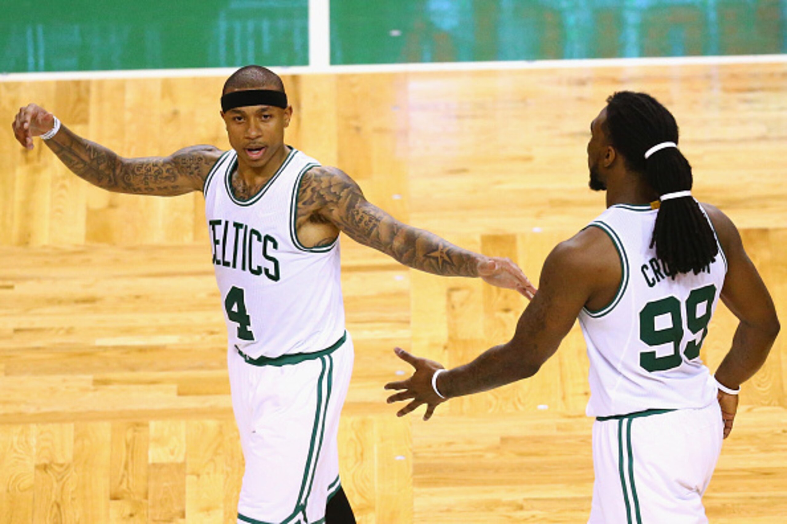 BOSTON, MA - APRIL 24:  Isaiah Thomas #4 of the Boston Celtics celebrates with Jae Crowder #99 at the end of the fourth quarter of Game Four of the Eastern Conference Quarterfinals during the 2016 NBA Playoffs at TD Garden on April 24, 2016 in Boston, Mas