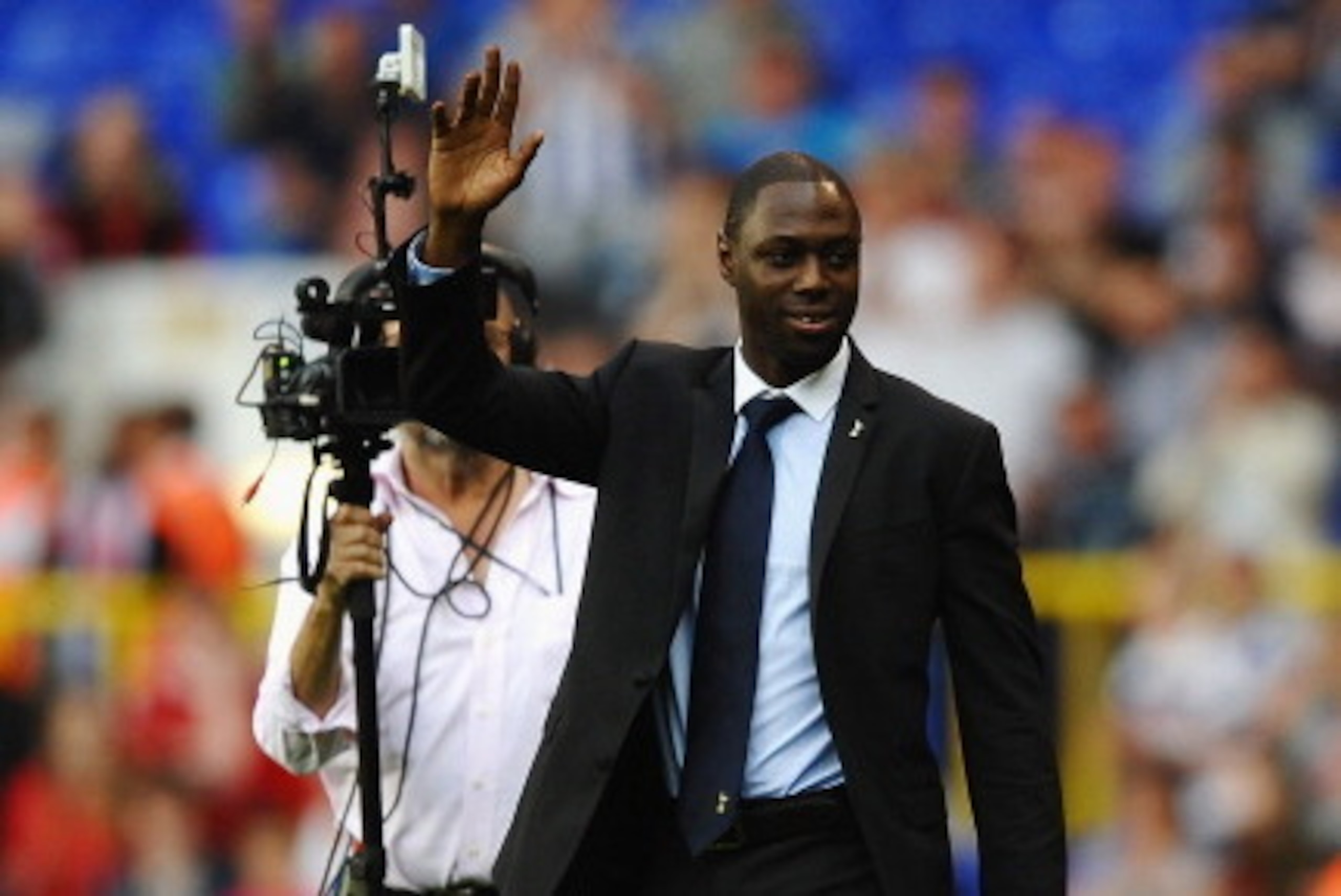 LONDON, ENGLAND - AUGUST 25: Former Spurs player Ledley King waves to fans during the Barclays Premier League match between Tottenham Hotspur and West Bromwich Albion at White Hart Lane on August 25, 2012 in London, England.  (Photo by Laurence Griffiths/