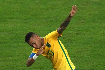RIO DE JANEIRO, BRAZIL - AUGUST 20:  Neymar of Brazil reacts after scoring during the Men's Football Final between Brazil and Germany at the Maracana Stadium on Day 15 of the Rio 2016 Olympic Games on August 20, 2016 in Rio de Janeiro, Brazil.  (Photo by 