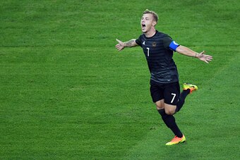 Germany's midfielder Maximilian Meyer celebrates scoring his team's first goal during the Rio 2016 Olympic Games men's football gold medal match between Brazil and Germany at the Maracana stadium in Rio de Janeiro on August 20, 2016.  / AFP / Martin BERNE