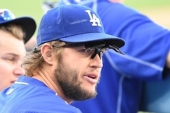 Aug 7, 2016; Los Angeles, CA, USA;  Los Angeles Dodgers starting pitcher Clayton Kershaw (22) in the dugout during the fifth inning of the game against the Boston Red Sox at Dodger Stadium. Mandatory Credit: Jayne Kamin-Oncea-USA TODAY Sports