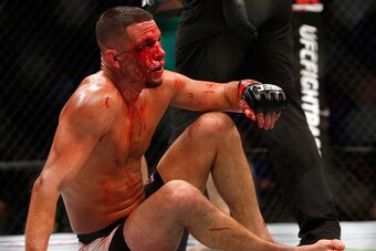LAS VEGAS, NV - AUGUST 20:  Nate Diaz gets up from the canvas during his welterweight rematch against Conor McGregor at the UFC 202 event at T-Mobile Arena on August 20, 2016 in Las Vegas, Nevada. McGregor won by majority decision.  (Photo by Steve Marcus