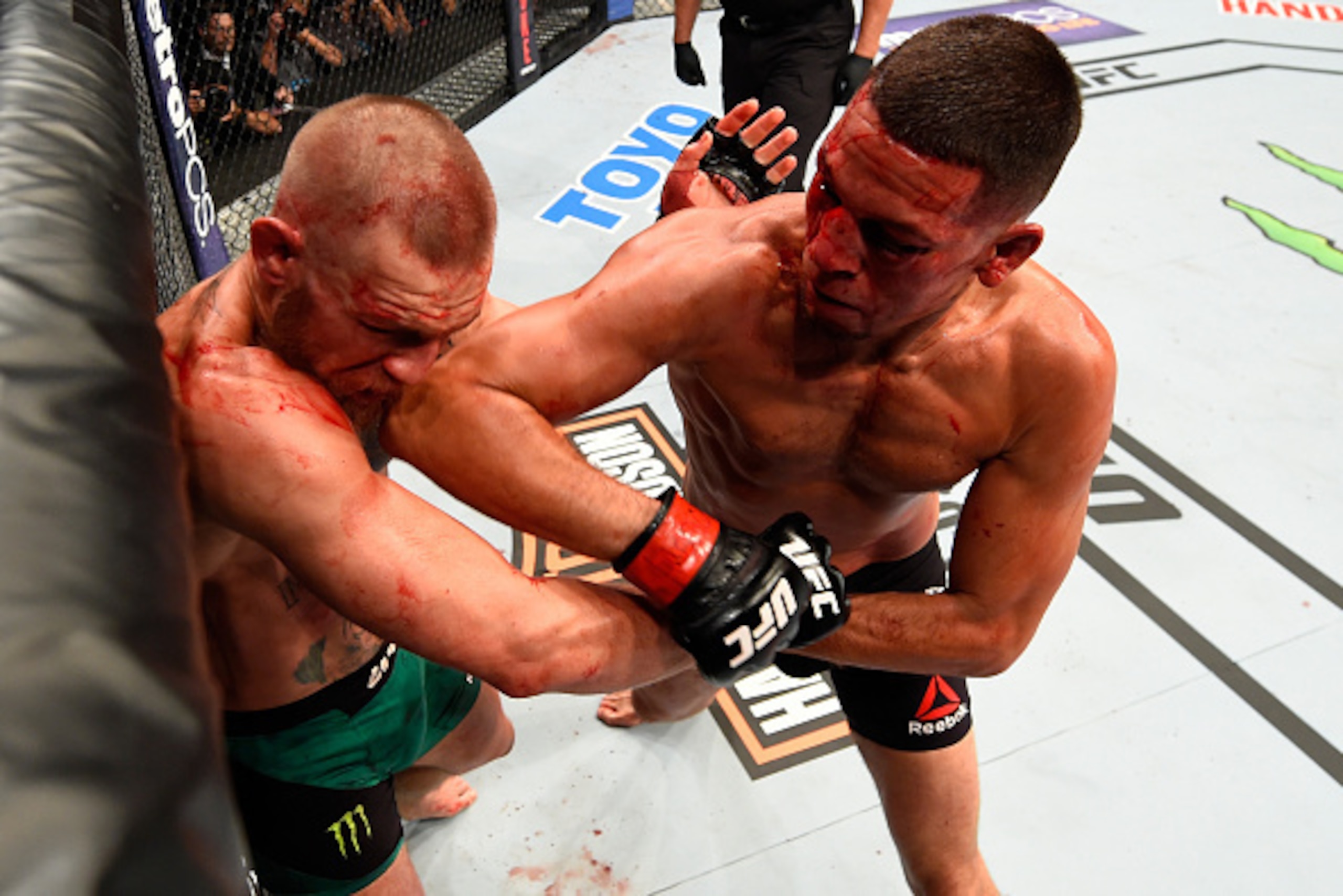 LAS VEGAS, NV - AUGUST 20: Nate Diaz fights Conor McGregor of Ireland in their welterweight bout during the UFC 202 event at T-Mobile Arena on August 20, 2016 in Las Vegas, Nevada. (Photo by Josh Hedges/Zuffa LLC/Zuffa LLC via Getty Images) LAS VEGAS, NV - AUGUST 20: Nate Diaz fights Conor McGregor of Ireland in their welterweight bout during the UFC 202 event at T-Mobile Arena on August 20, 2016 in Las Vegas, Nevada. (Photo by Josh Hedges/Zuffa LLC/Zuffa LLC via Getty Images)