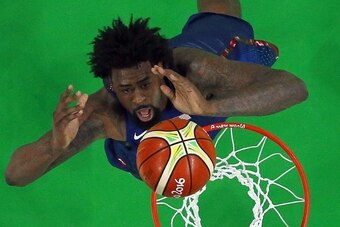 An overview shows USA's centre DeAndre Jordan go to the basket during a Men's semi-final basketball match between Spain and USA at the Carioca Arena 1 in Rio de Janeiro on August 19, 2016 during the Rio 2016 Olympic Games. / AFP / POOL / Jim YOUNG        