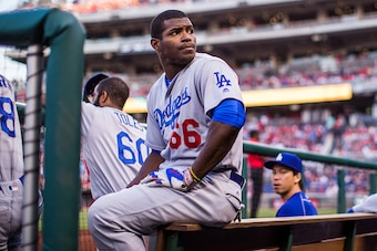 WASHINGTON, DC - JULY 20:  Yasiel Puig #66 of the Los Angeles Dodgers looks on during the game against the Washington Nationals at Nationals Park on July 20, 2016 in Washington, DC. (Photo by Rob Tringali/SportsChrome/Getty Images)
