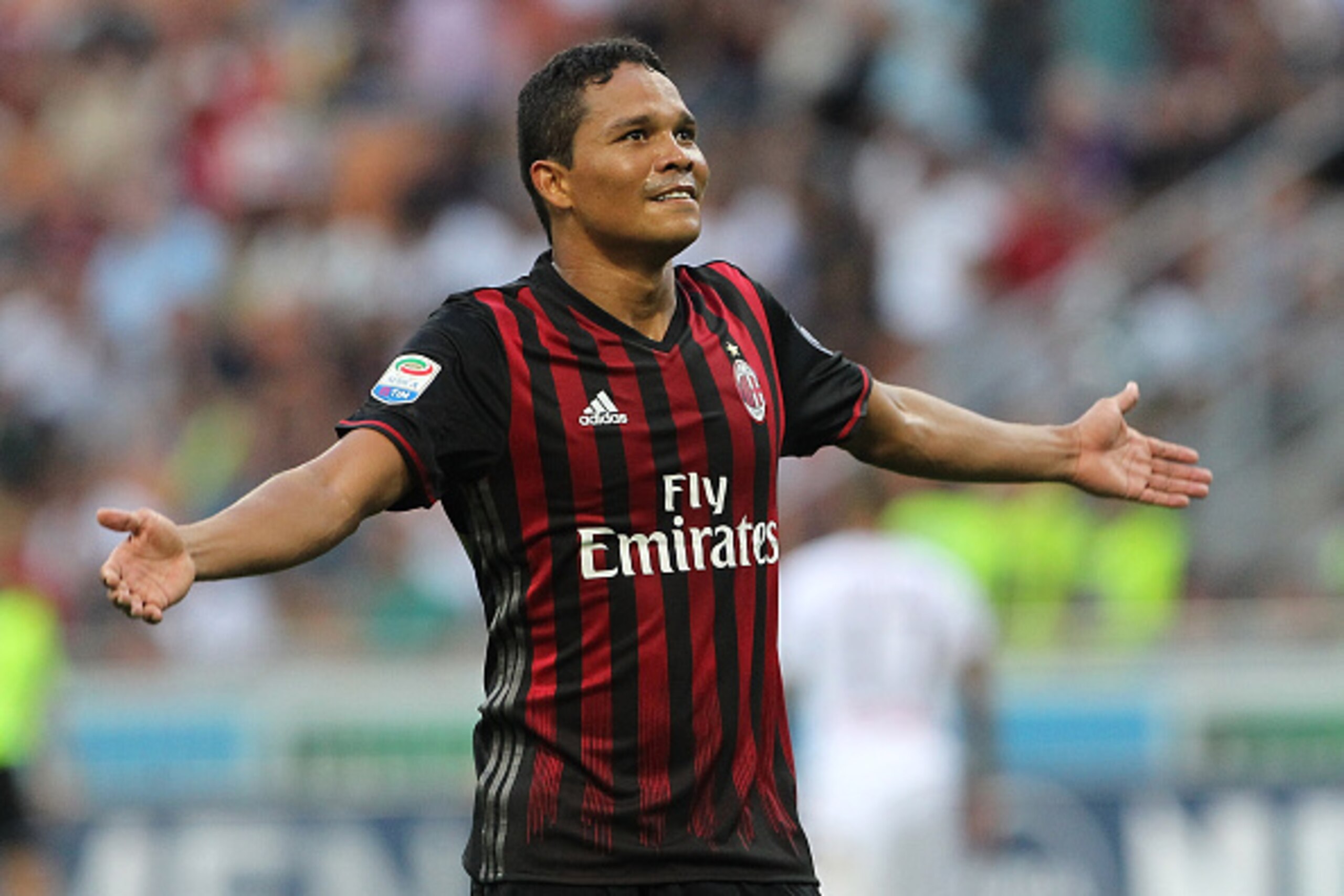 MILAN, ITALY - AUGUST 21:  Carlos Bacca of AC Milan celebrates his third goal during the Serie A match between AC Milan and FC Torino at Stadio Giuseppe Meazza on August 21, 2016 in Milan, Italy.  (Photo by Marco Luzzani/Getty Images)