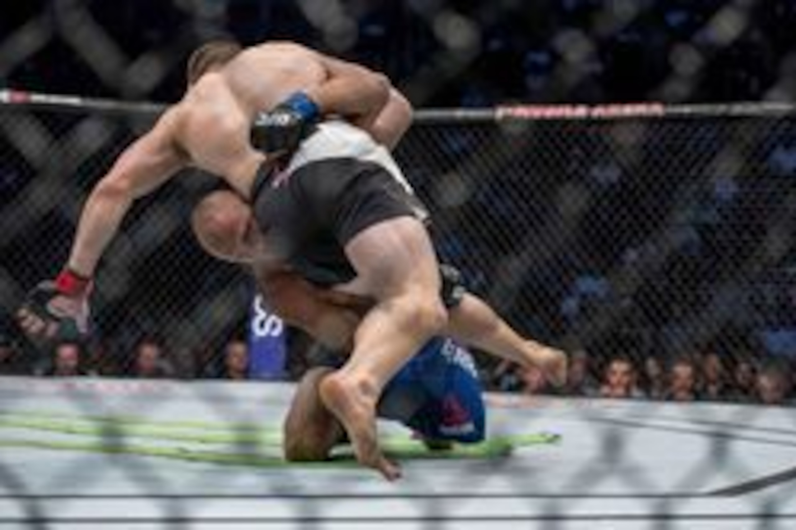 Aug 20, 2016; Las Vegas, NV, USA; Rick Story (red gloves) competes against Donald Corrine (blue gloves) during UFC 202 at T-Mobile Arena. Mandatory Credit: Joshua Dahl-USA TODAY Sports