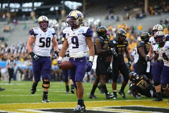 DALLAS, TX - DECEMBER 26:  Myles Gaskin #9 of the Washington Huskies celebrates a touchdown against the Southern Miss Golden Eagles during the Zaxby's Heart of Dallas Bowl at Cotton Bowl on December 26, 2015 in Dallas, Texas.  (Photo by Ronald Martinez/Ge