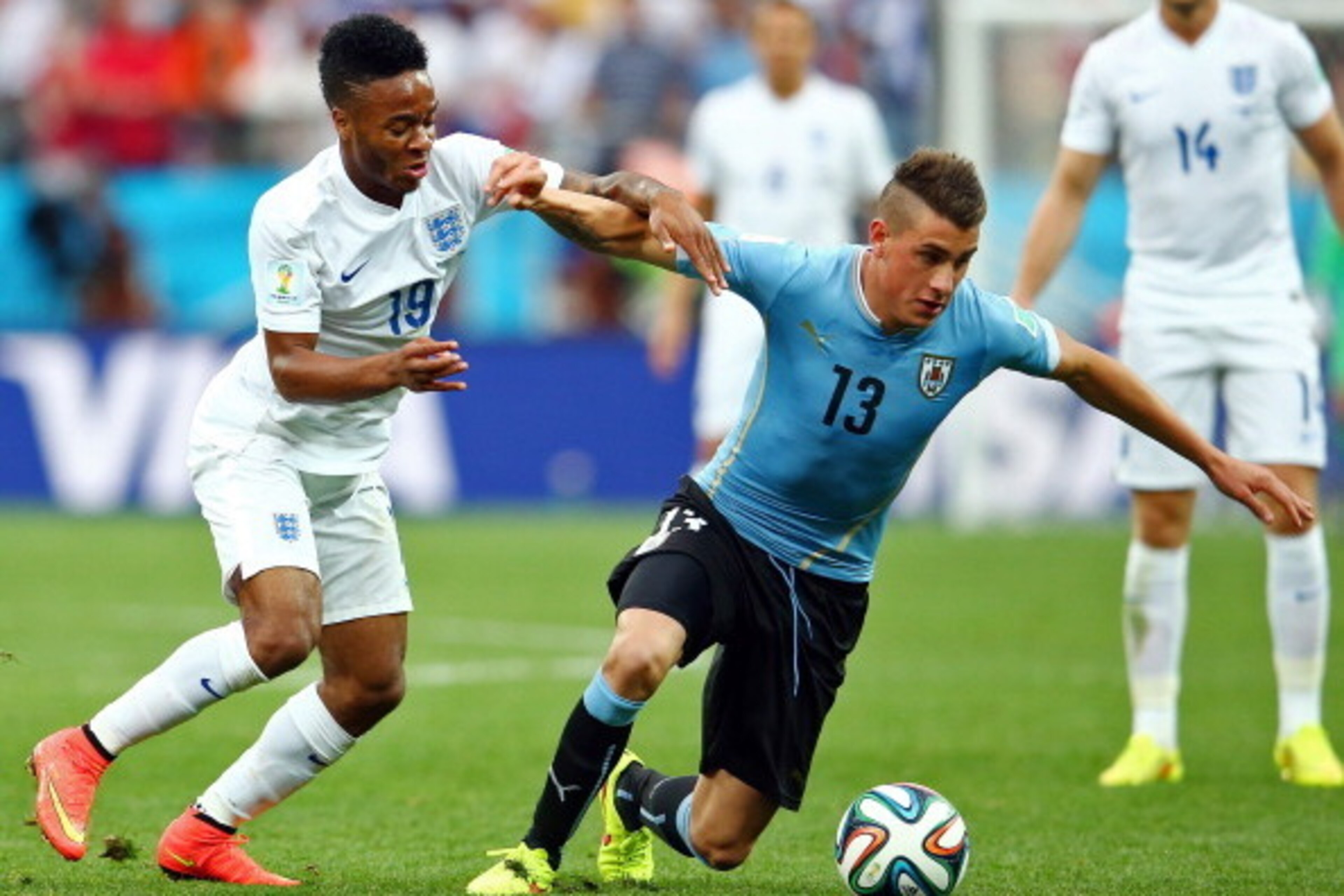 SAO PAULO, BRAZIL - JUNE 19: Jose Gimenez of Uruguay fights off Raheem Sterling during the 2014 FIFA World Cup Brazil Group D match between Uruguay and England at Arena de Sao Paulo on June 19, 2014 in Sao Paulo, Brazil. (Photo by Julian Finney/Getty Ima SAO PAULO, BRAZIL - JUNE 19: Jose Gimenez of Uruguay fights off Raheem Sterling during the 2014 FIFA World Cup Brazil Group D match between Uruguay and England at Arena de Sao Paulo on June 19, 2014 in Sao Paulo, Brazil. (Photo by Julian Finney/Getty Ima
