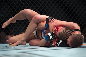 LAS VEGAS, NEVADA - DECEMBER 10:  (R-L) Rose Namajunas attempts to submit Paige VanZant in their women's strawweight bout during the UFC Fight Night event at The Chelsea at the Cosmopolitan of Las Vegas on December 10, 2015 in Las Vegas, Nevada.  (Photo b