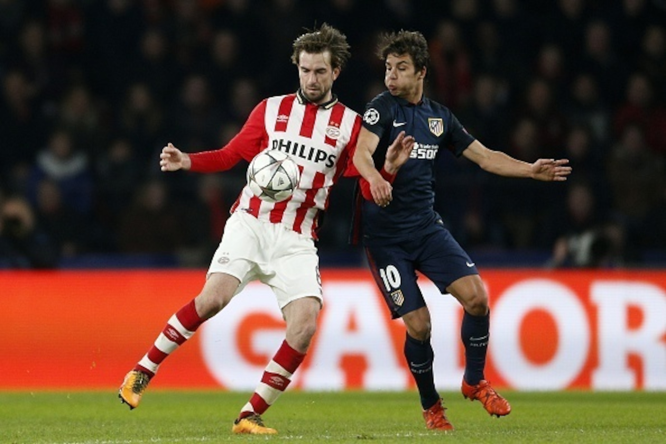 (L-R), Davy Propper of PSV, Oliver Torres of Club Atletico de Madrid during the UEFA Champions League Round of 16, First leg match between PSV Eindhoven and Atletico Madrid on February 24, 2016 at the Philips stadium in Eindhoven, The Netherlands.(Photo b