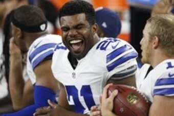 Aug 19, 2016; Arlington, TX, USA; Dallas Cowboys running back Ezekiel Elliott (21) laughs on the sidelines against the Miami Dolphins at AT&T Stadium. Dallas won 41-14. Mandatory Credit: Tim Heitman-USA TODAY Sports