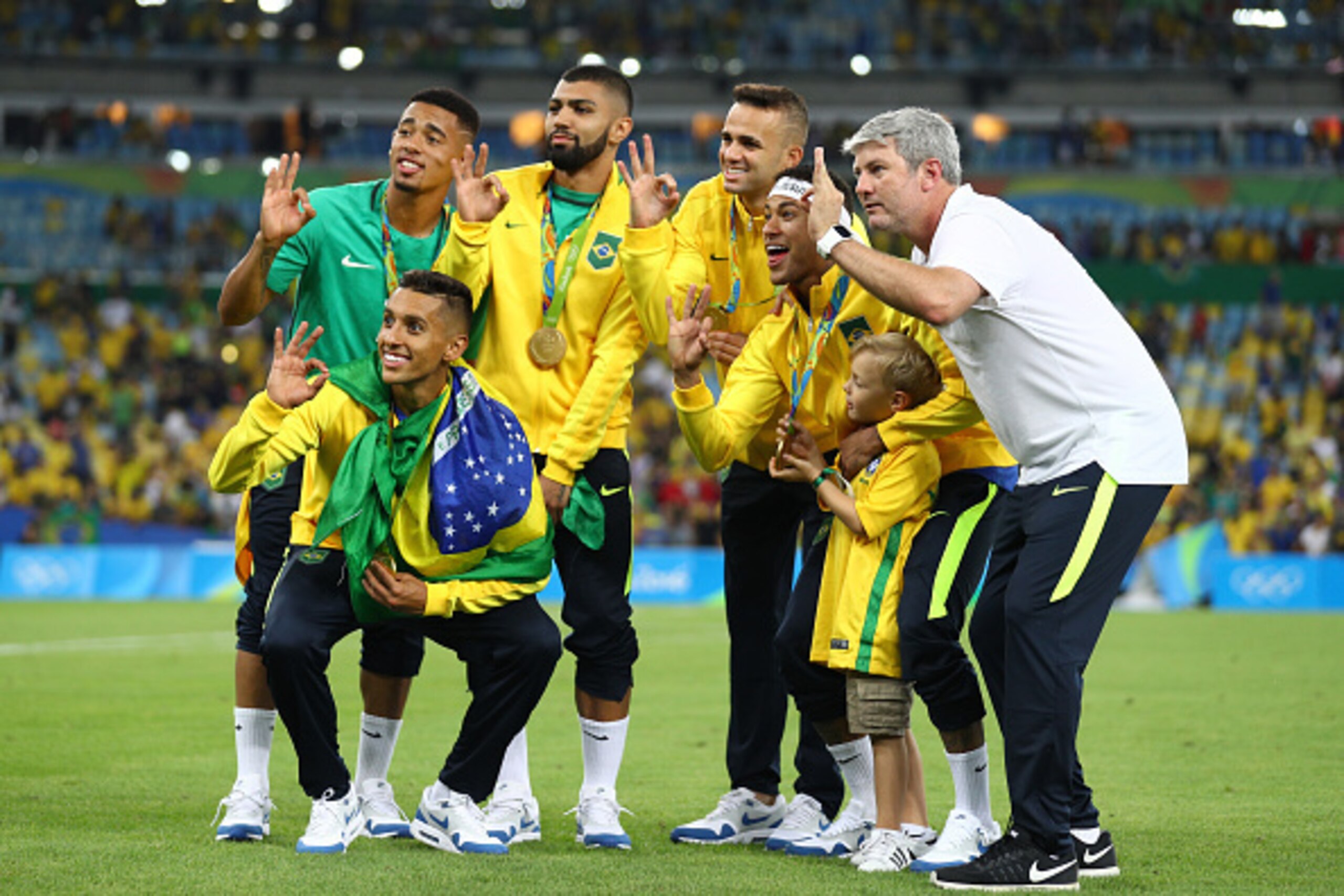 RIO DE JANEIRO, BRAZIL - AUGUST 20:  Marquinhos of Brazil, Gabriel Jesus of Brazil, Gabriel Barbosa of Brazil, Luan of Brazil and Neymar of Brazil celebrate following the Men's Football Final between Brazil and Germany at the Maracana Stadium on Day 15 of