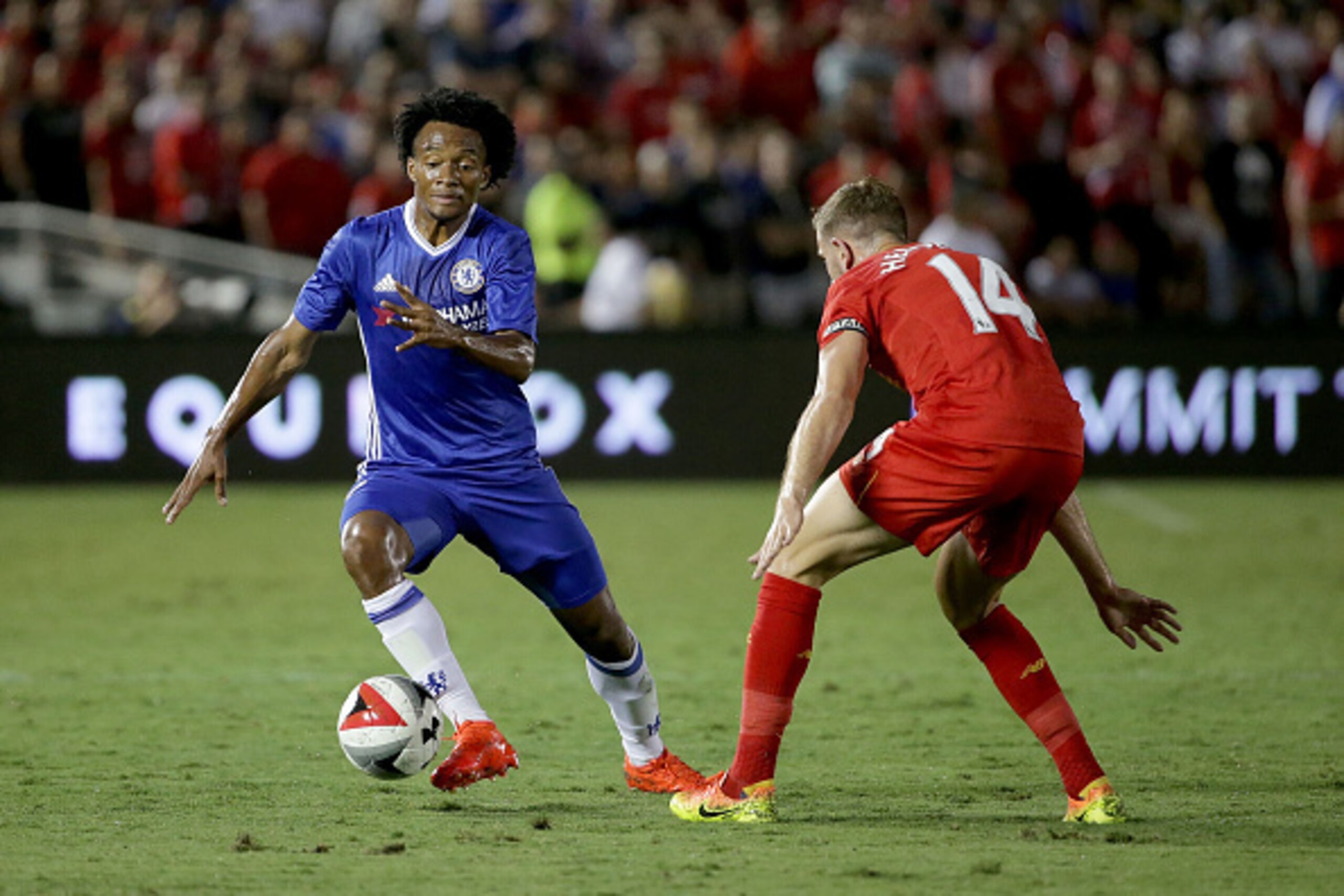 PASADENA, CA - JULY 27:  Juan Cuadrado #17 of Chelsea is defended by Jordan Henderson #14 of Liverpool during the 2016 International Champions Cup at Rose Bowl on July 27, 2016 in Pasadena, California.  (Photo by Jeff Gross/Getty Images)