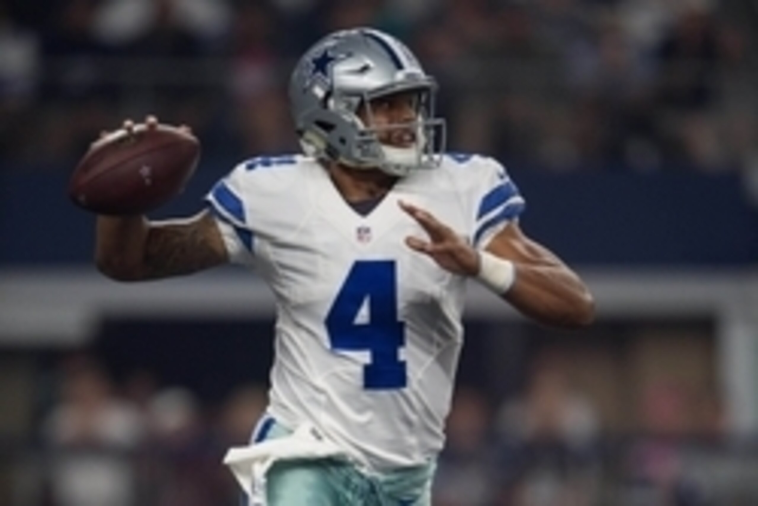 Aug 19, 2016; Arlington, TX, USA; Dallas Cowboys quarterback Dak Prescott (4) rolls out to pass against the Miami Dolphins during the first quarter at AT&T Stadium. Mandatory Credit: Jerome Miron-USA TODAY Sports