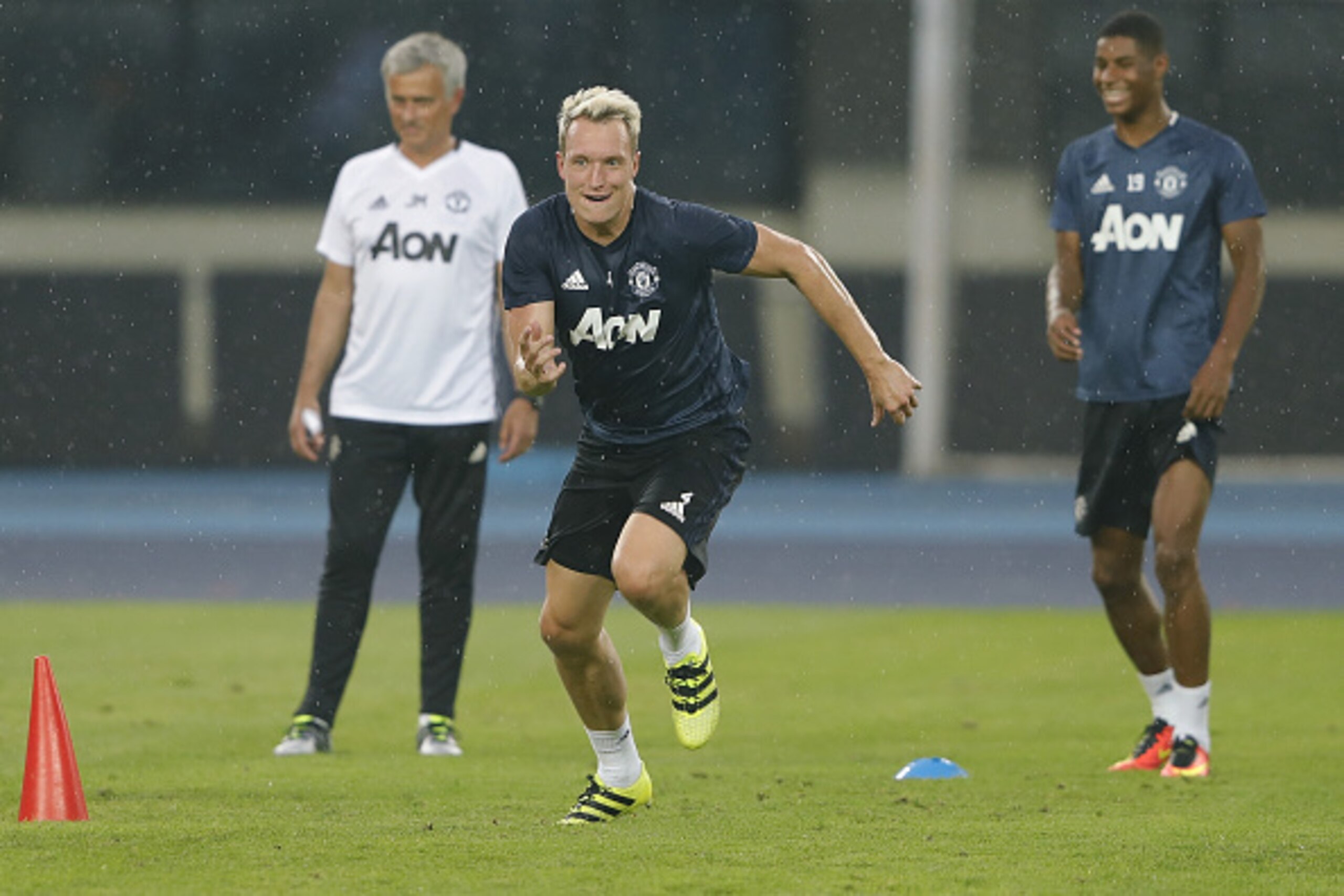 BEIJING, CHINA - JULY 24: Phil Jones of Manchester United in action  during the team training session for the 2016 International Champions Cup match between Manchester City and Manchester United at Olympic Sports Center Stadium on July 24, 2016 in Beijing