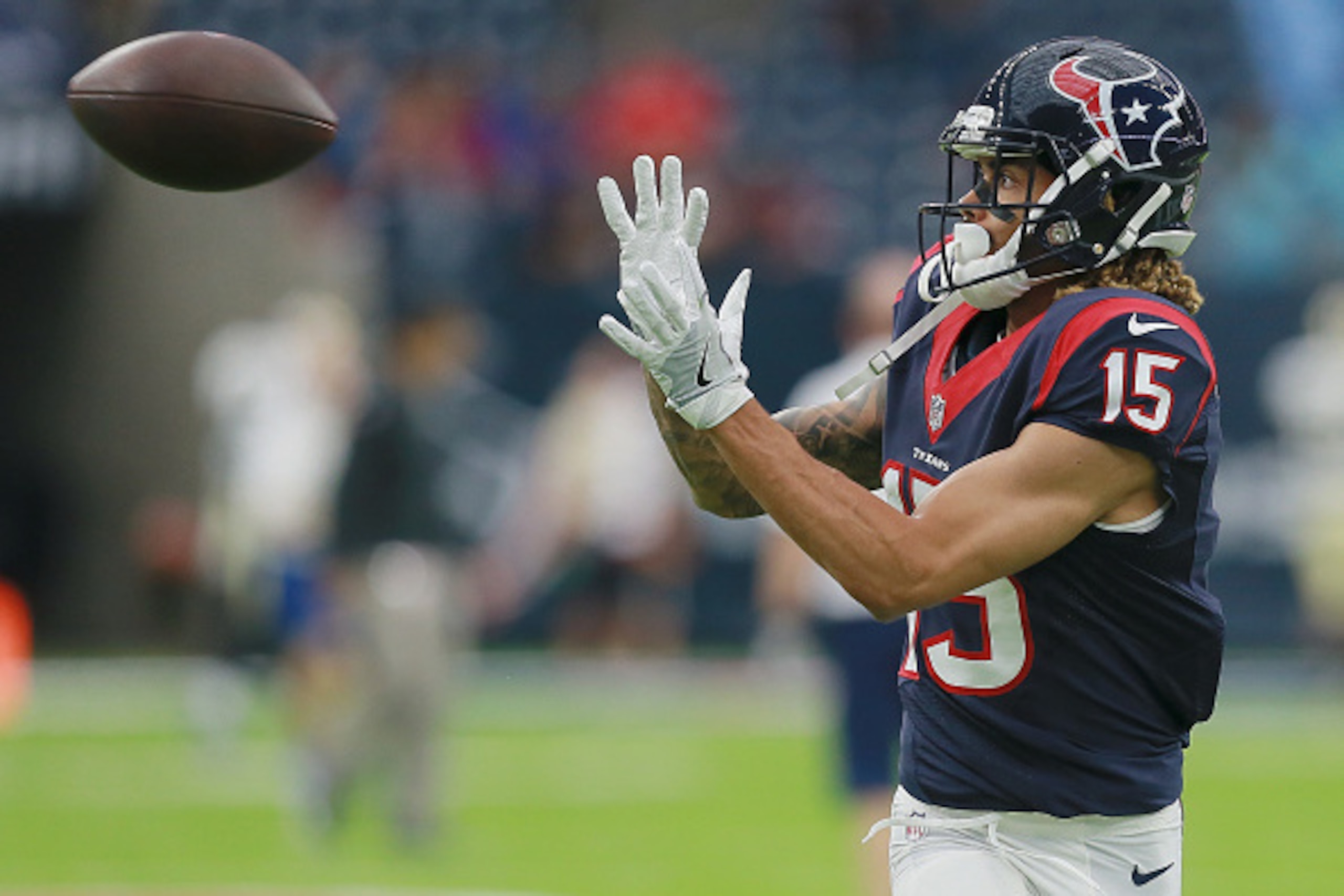 HOUSTON, TX - AUGUST 20:   Will Fuller #15 of the Houston Texans catches a pass in warmups before a preseason NFL game at NRG Stadium on August 20, 2016 in Houston, Texas.  (Photo by Bob Levey/Getty Images)