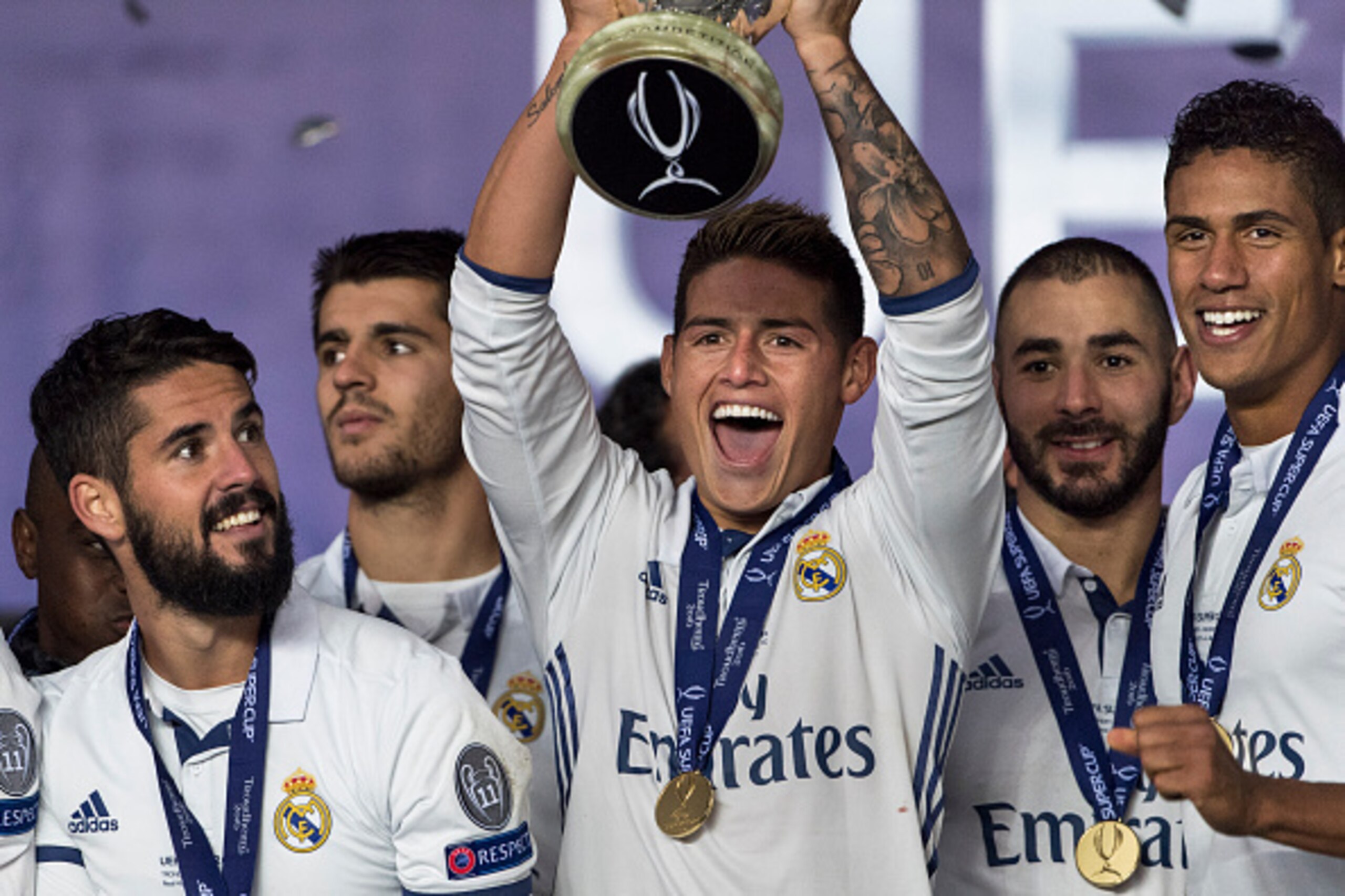 TRONDHEIM, NORWAY - AUGUST 09: Real Madrid players James Rodriguez, Isco, Alvaro Morata, Karim Benzema, Raphael Varane celebrate with team mates and the trophy after theUEFA Super Cup match between Real Madrid and Sevilla at the Lerkendal Stadion on Augus TRONDHEIM, NORWAY - AUGUST 09: Real Madrid players James Rodriguez, Isco, Alvaro Morata, Karim Benzema, Raphael Varane celebrate with team mates and the trophy after theUEFA Super Cup match between Real Madrid and Sevilla at the Lerkendal Stadion on Augus
