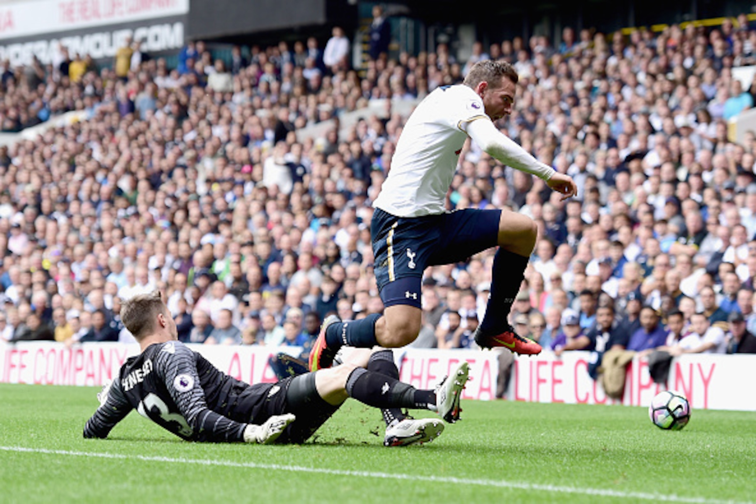 LONDON, ENGLAND - AUGUST 20:  Wayne Hennessey of Crystal Palace challenges Vincent Janssen of Tottenham Hotspur during the Premier League match between Tottenham Hotspur and Crystal Palace at White Hart Lane on August 20, 2016 in London, England.  (Photo 