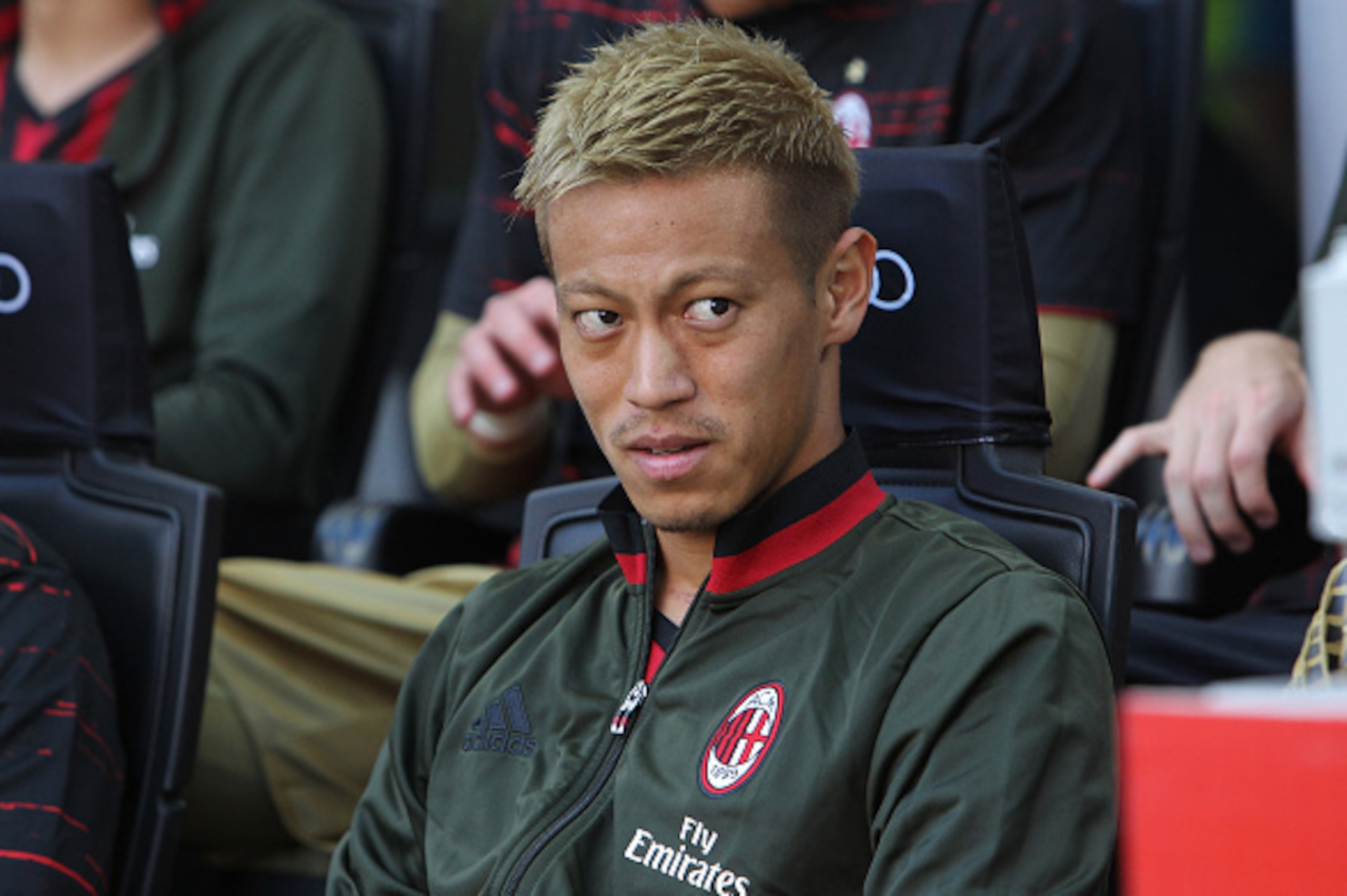 MILAN, ITALY - AUGUST 21:  Keisuke Honda of AC Milan looks on before the Serie A match between AC Milan and FC Torino at Stadio Giuseppe Meazza on August 21, 2016 in Milan, Italy.  (Photo by Marco Luzzani/Getty Images)