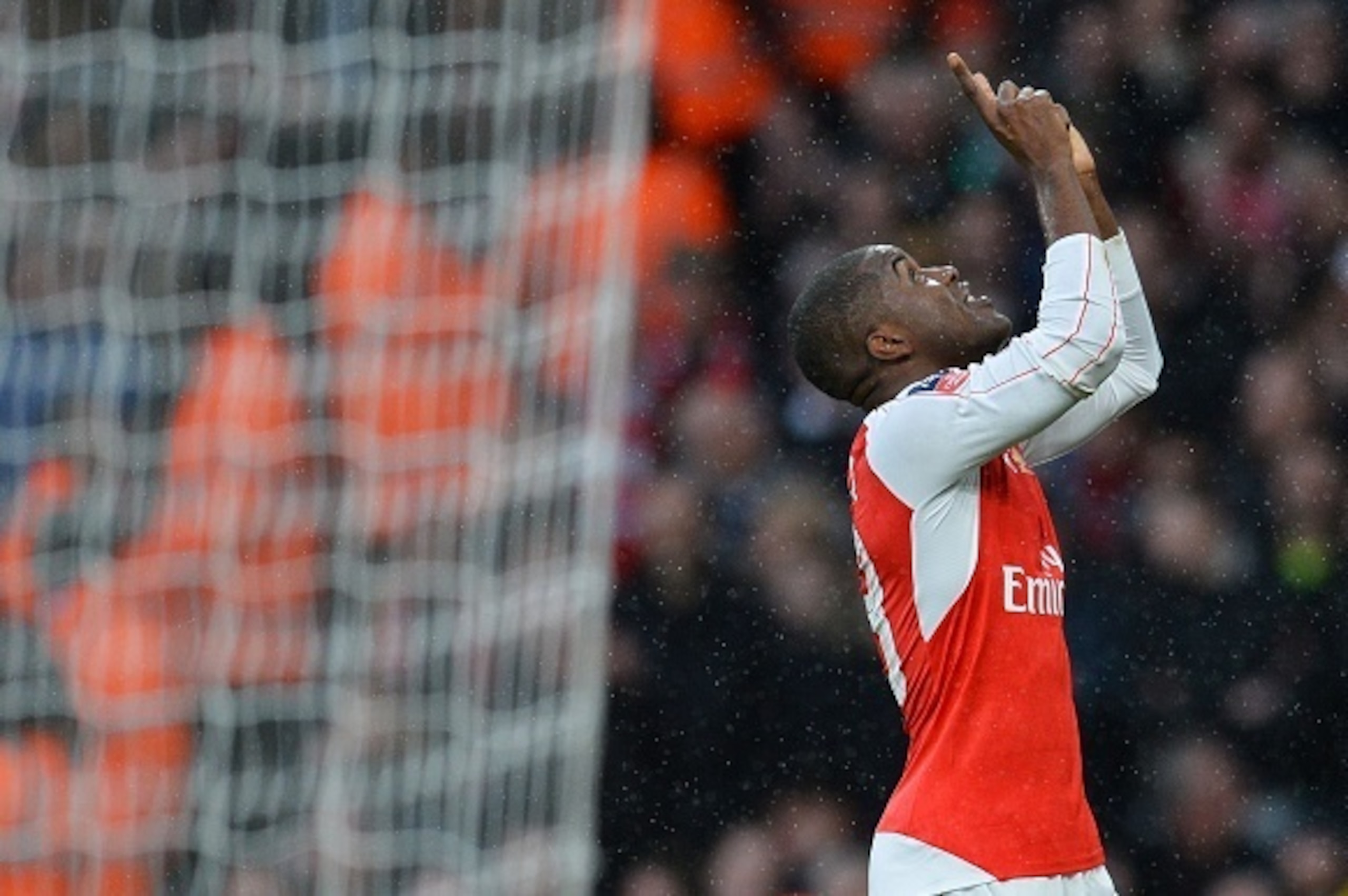 Arsenal's Costa Rican striker Joel Campbell celebrates scoring their first goal during the English FA Cup third-round football match between Arsenal and Sunderland at the Emirates Stadium in London on January 9, 2016.   AFP PHOTO / GLYK KIRK

RESTRICTED T