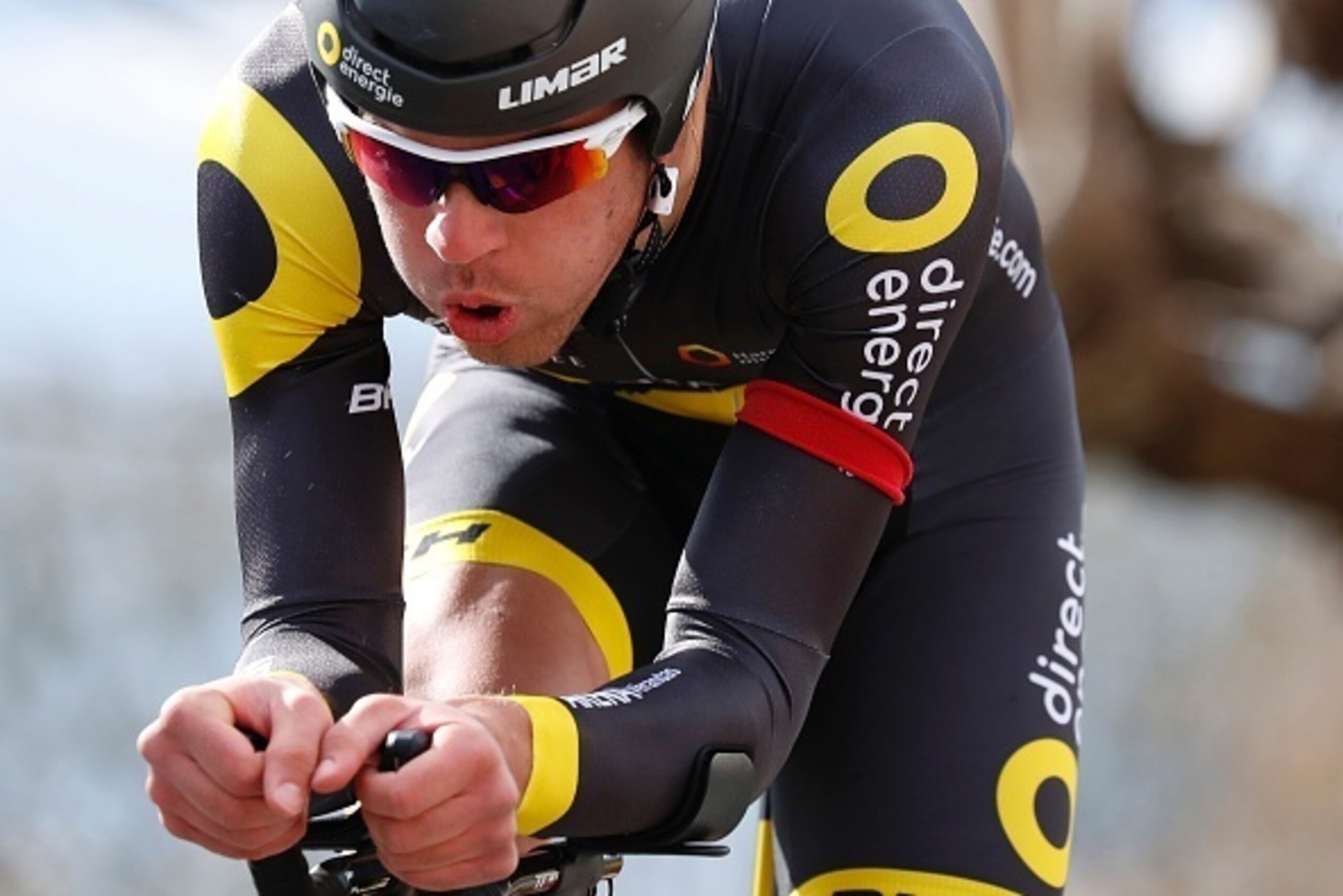 France's Lilian Calmejane competes during the 6,1 km individual time-trial of the opening prologue of the 74th edition of the Paris-Nice cycling race on March 6, 2016 in Conflans-Sainte-Honorine. / AFP / KENZO TRIBOUILLARD        (Photo credit should read
