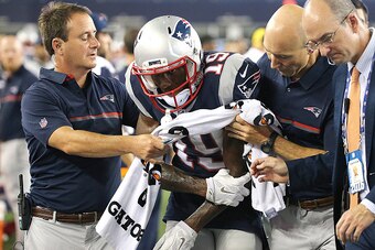 FOXBORO, MA - AUGUST 11:  Malcolm Mitchell #19 of the New England Patriots leaves the field with an injury in the first half during a preseason game against the New Orleans Saints at Gillette Stadium on August 11, 2016 in Foxboro, Massachusetts. (Photo by