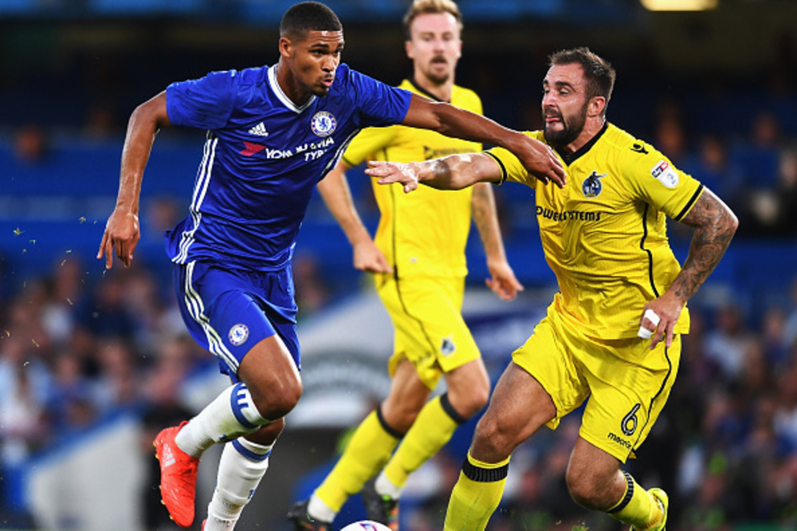 LONDON, ENGLAND - AUGUST 23: Ruben Loftus-Cheek of Chelsea is closed down by Peter Hartley of Bristol Rovers during the EFL Cup second round match between Chelsea and Bristol Rovers at Stamford Bridge on August 23, 2016 in London, England.  (Photo by Mich