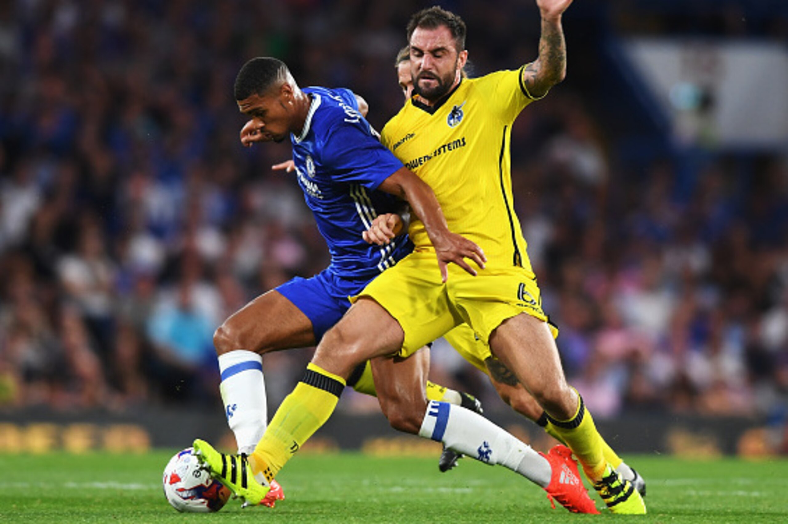 LONDON, ENGLAND - AUGUST 23:  Ruben Loftus-Cheek of Chelsea is closed down by Peter Hartley of Bristol Rovers during the EFL Cup second round match between Chelsea and Bristol Rovers at Stamford Bridge on August 23, 2016 in London, England.  (Photo by Mic