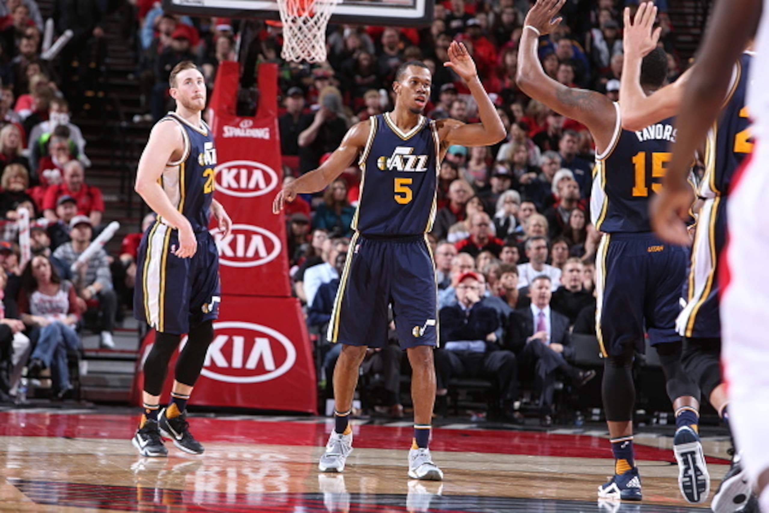 PORTLAND, OR - FEBRUARY 21: Rodney Hood #5 and Derrick Favors #15 of the Utah Jazz celebrate against the Portland Trail Blazers on February 21, 2016 at the Moda Center Arena in Portland, Oregon. NOTE TO USER: User expressly acknowledges and agrees that, b