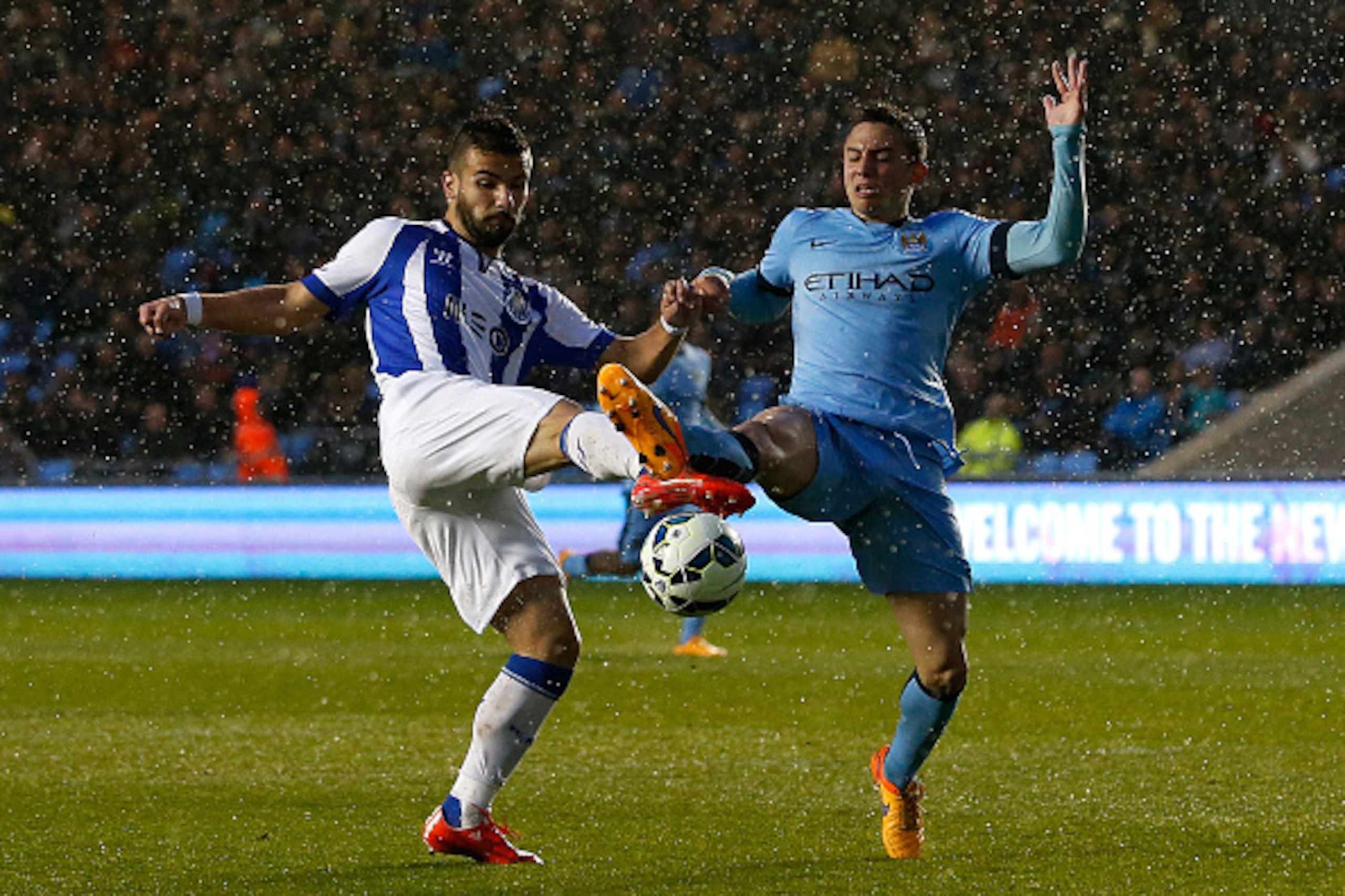 MANCHESTER, ENGLAND - MAY 8: Pablo Maffeo (R) of Manchester City in action with Leandro Silva of FC Porto during the Premier League International Cup Final match between Manchester City and FC Porto at the Manchester City Academy Stadium on May 8, 2015 in